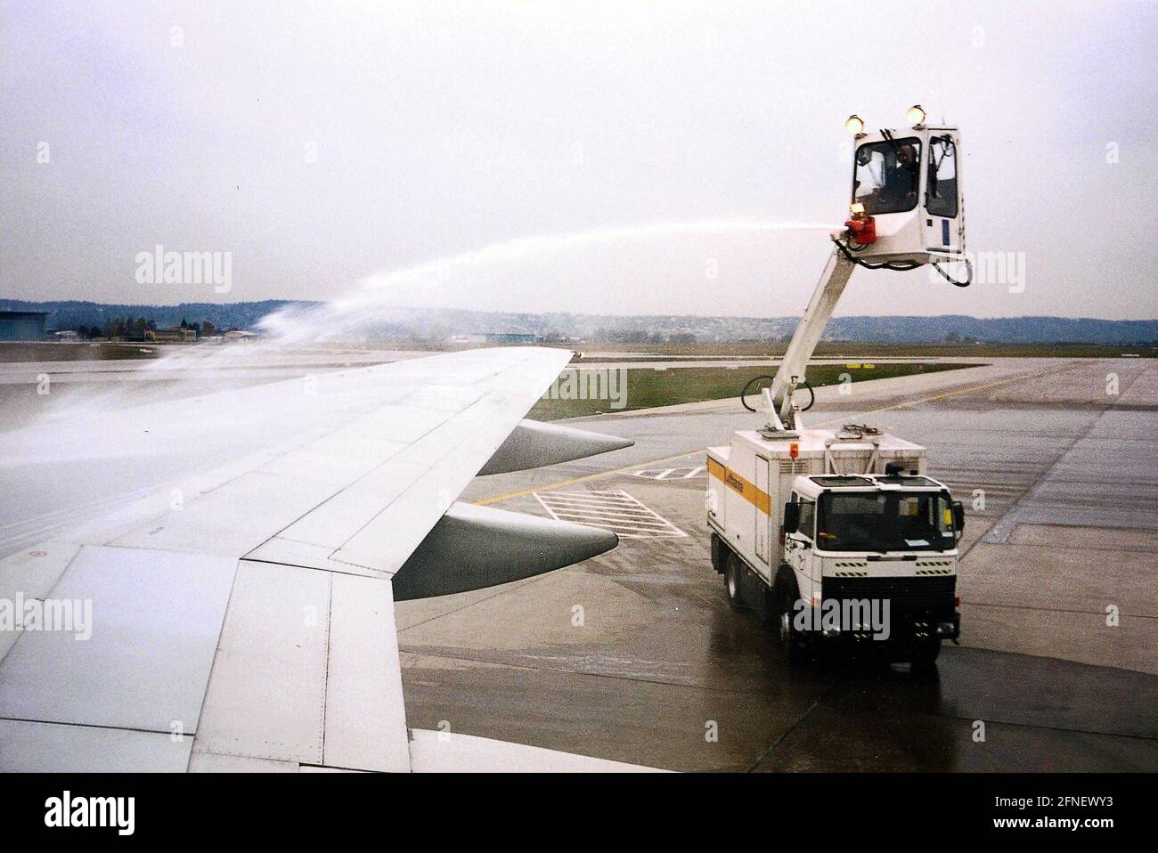 Aircraft de-icing at Munich airport [automated translation] Stock Photo