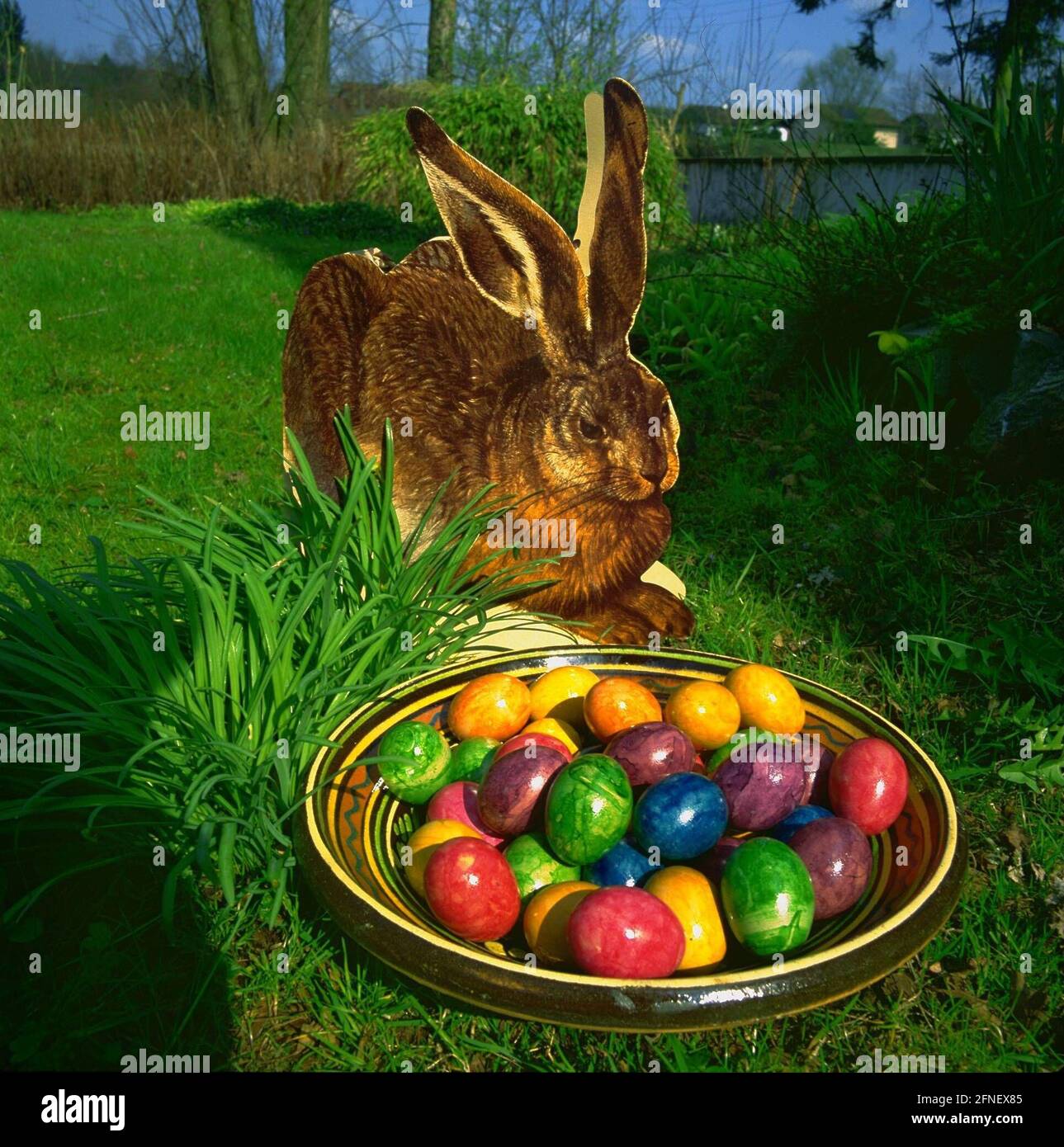 Easter The Easter bunny brings colourful Easter eggs in a basket