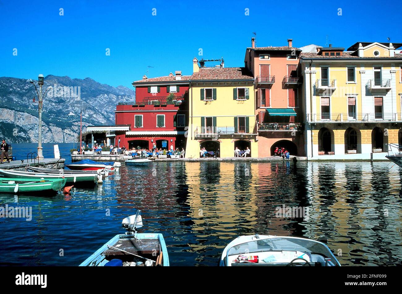 Colourful houses at the harbour of Malcesine on Lake Garda. [automated
