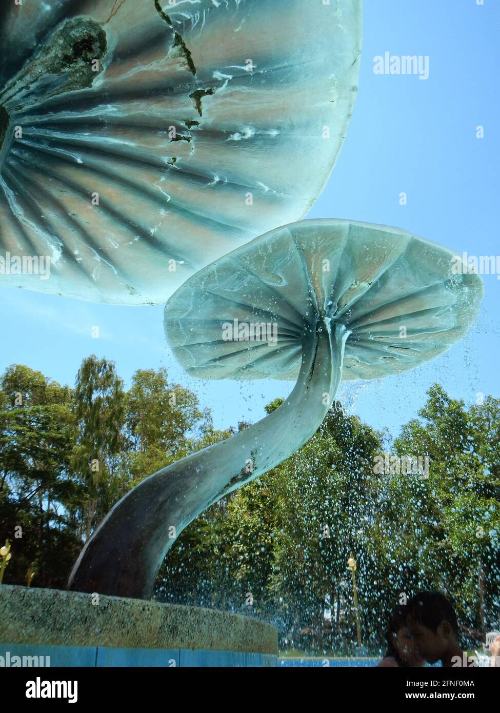 Mushroom fountains spraying water at The Water Garden, Bacolod