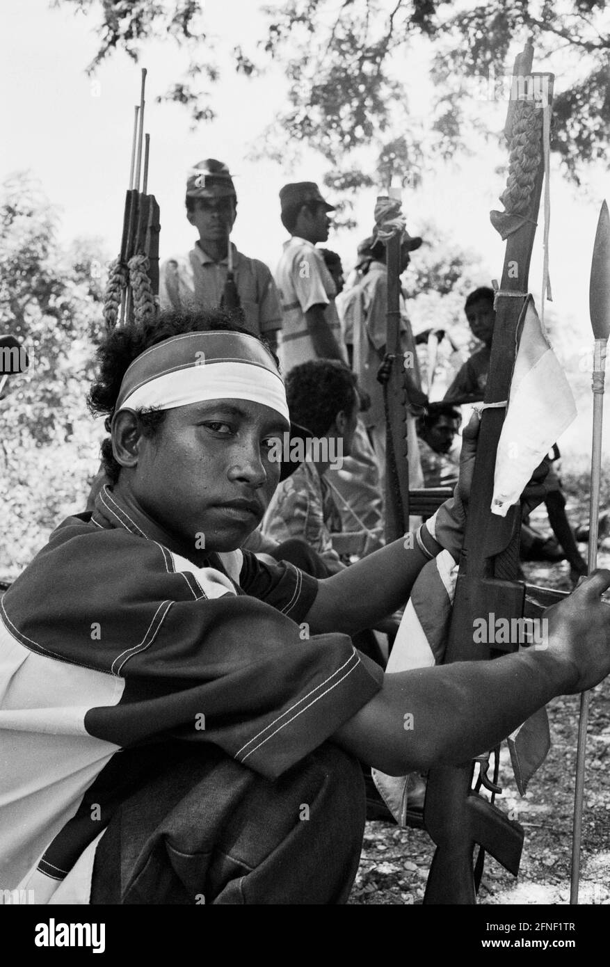 A member of Besih Merah Putih wearing a red and white headband at a gathering of pro-Indonesian militia and paramilitary units in Atabae, Bobonaro district. [automated translation] Stock Photo