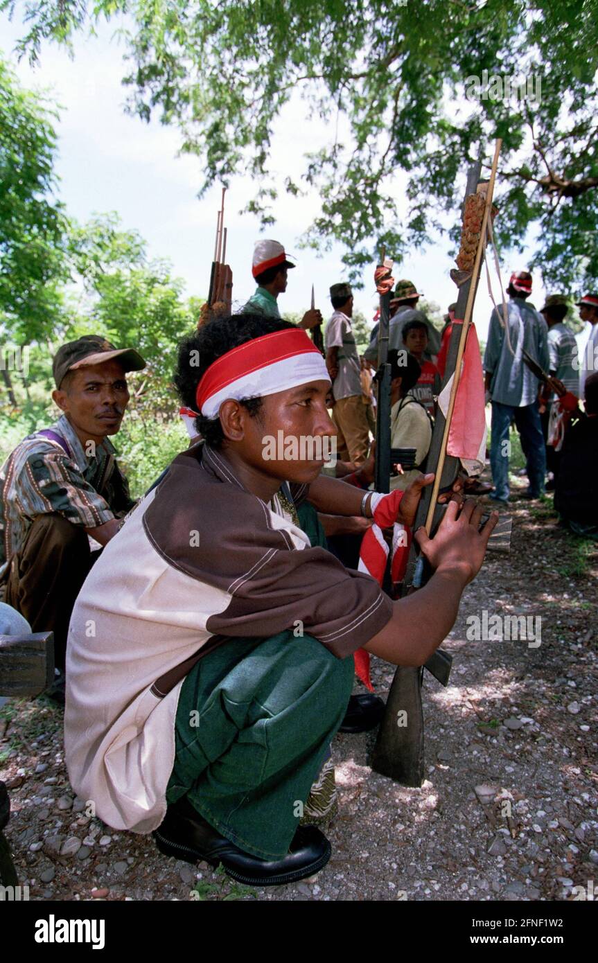Members of the Besih Merah Putih wearing red and white headbands at a gathering of pro-Indonesian militia and paramilitary units in Atabae, Bobonaro district. [automated translation] Stock Photo