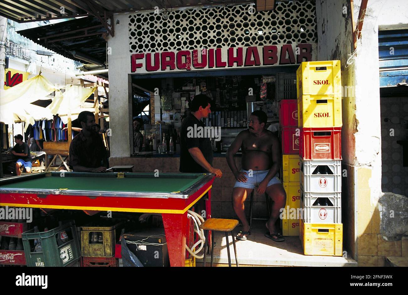 A street bar with a pool table in Favela Rocinha, the largest slum in Rio  de Janeiro. [automated translation] Stock Photo - Alamy