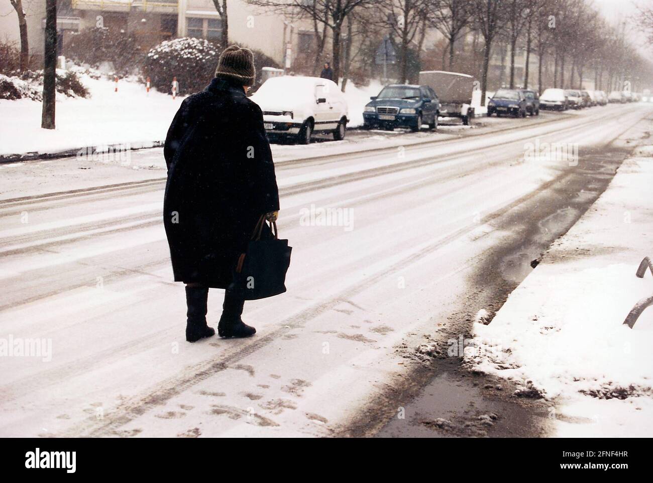 Old woman walks alone lonely hi-res stock photography and images - Alamy