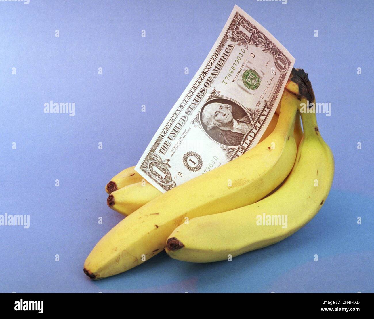Feature banana with dollar bill. [automated translation] Stock Photo