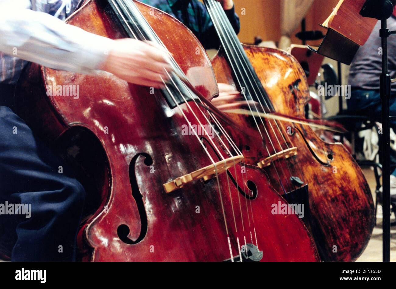 Two double bass players at the 'Deutsche Oper' in Berlin. [automated translation] Stock Photo