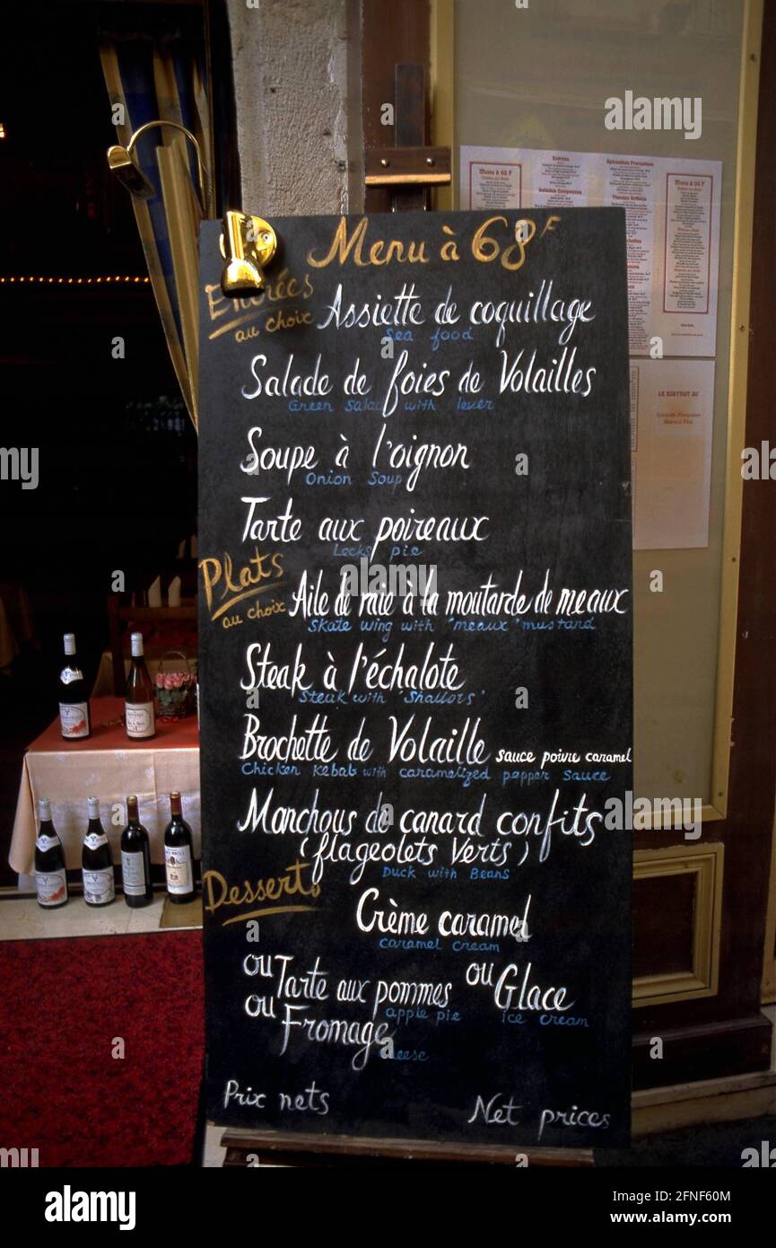 'The daily special (''Plats du jour'') in a Parisian restaurant, the menu consists of an appetizer (''Entrée''), main course (''Plat'') and dessert (''Dessert''). [automated translation]' Stock Photo