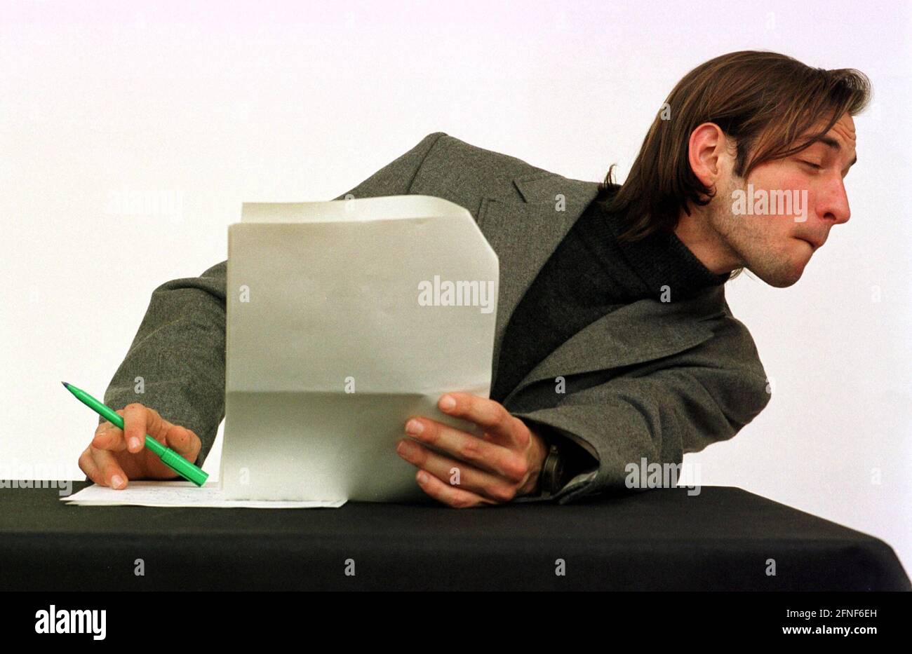 Student in an exam situation. [automated translation] Stock Photo