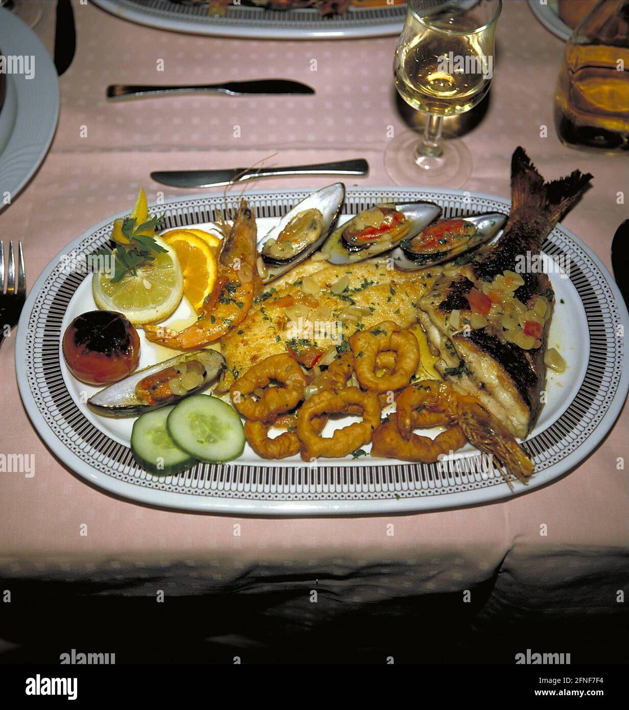 A platter of fish, including squid rings. [automated translation] Stock