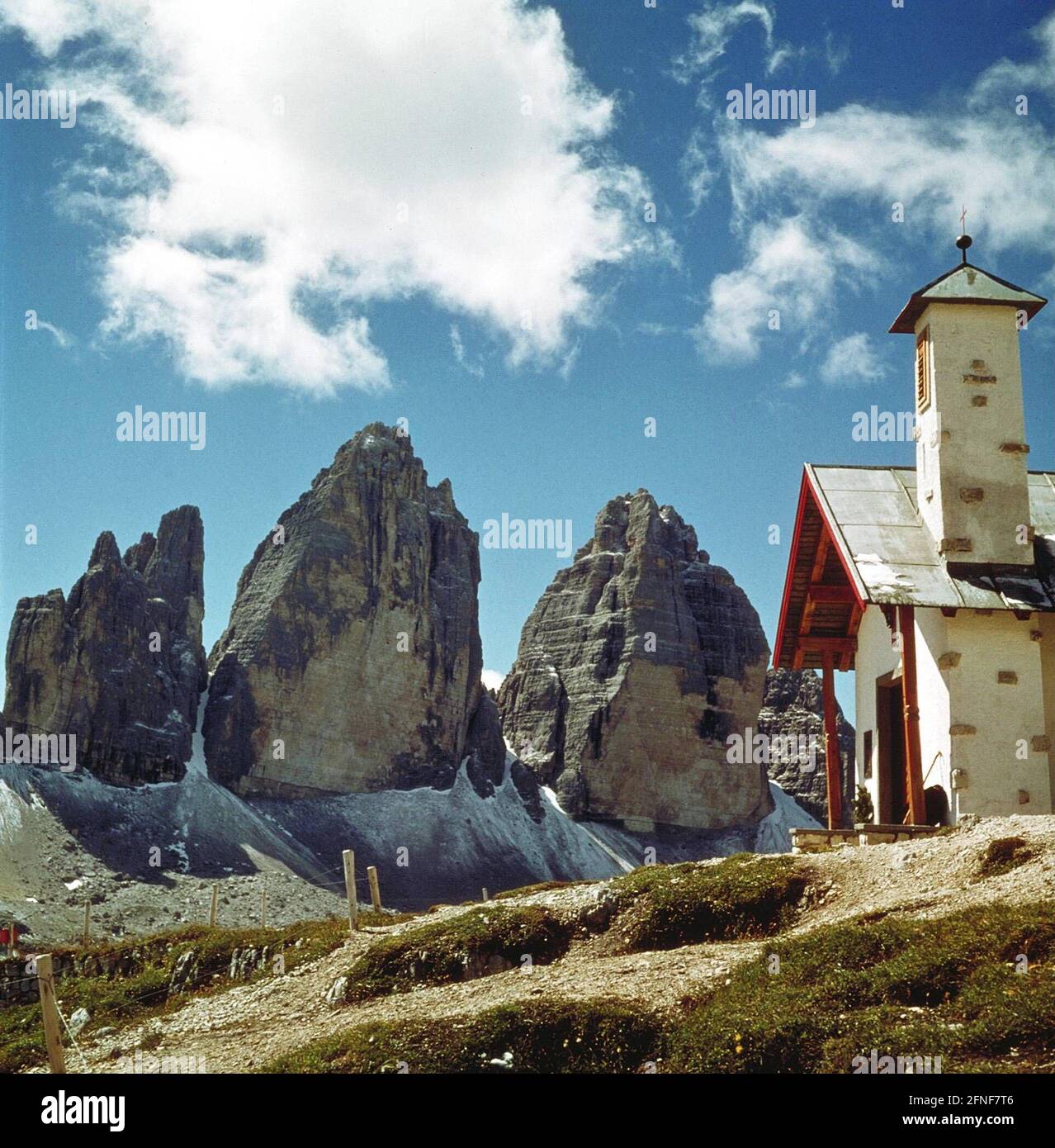 The 'Three Peaks', rock towers of the Sesto Dolomites with chapel, 1995 ...