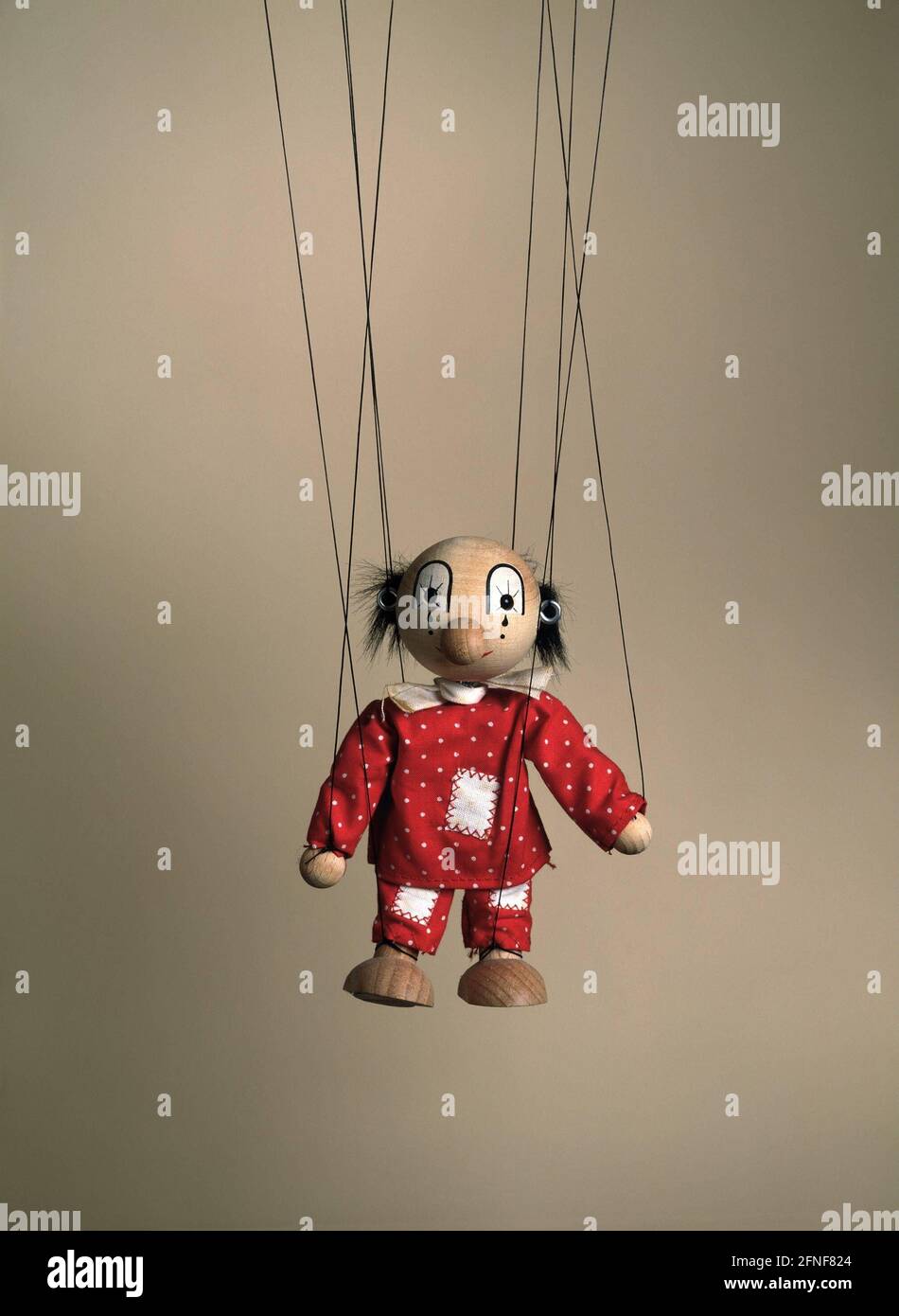 Puppet on strings. [automated translation] Stock Photo Alamy