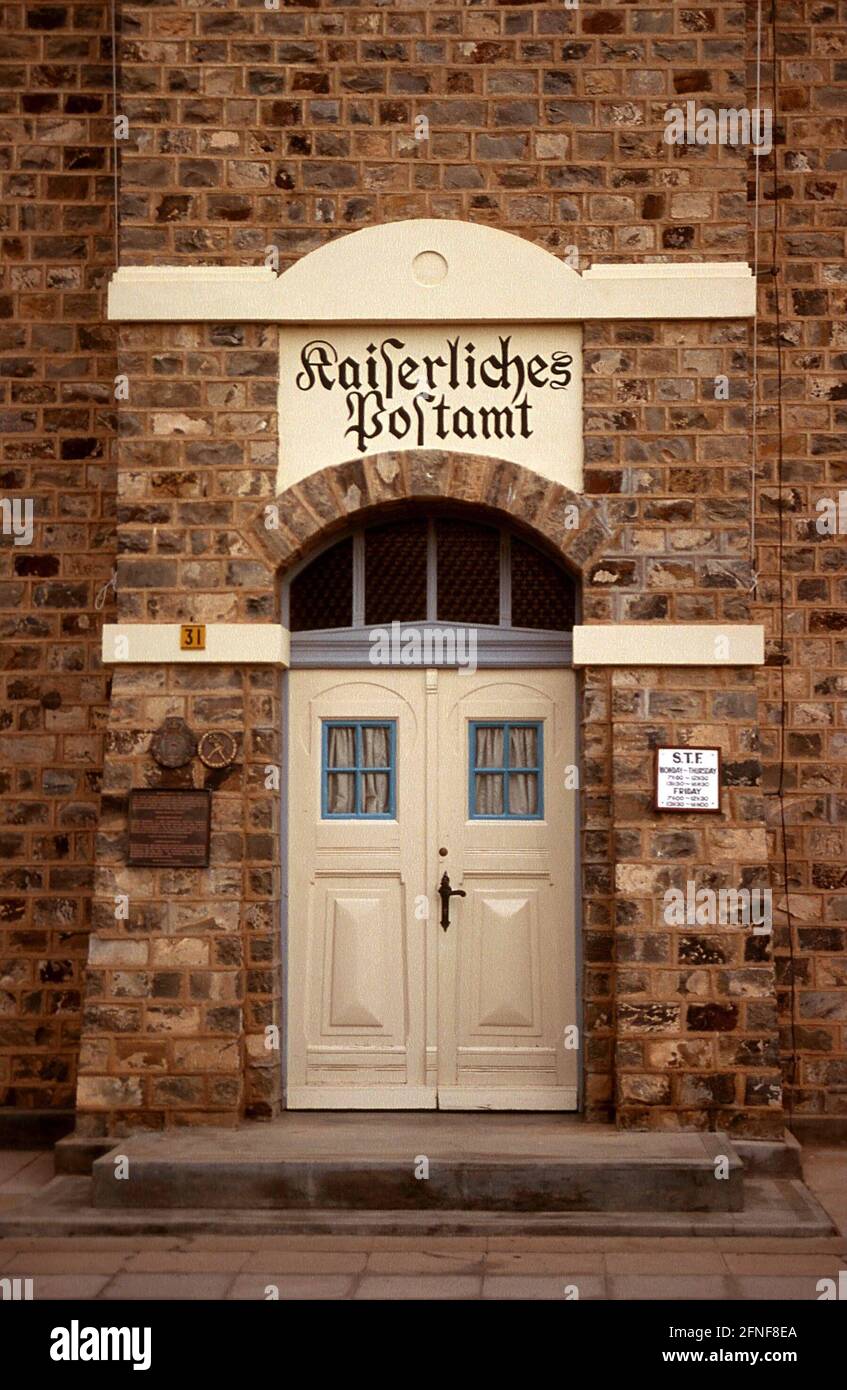 Entrance of the imperial post office in Lüderitz. The town is named after the Bremen merchant Adolf Lüderitz, who established a trading post here in 1883. [automated translation] Stock Photo