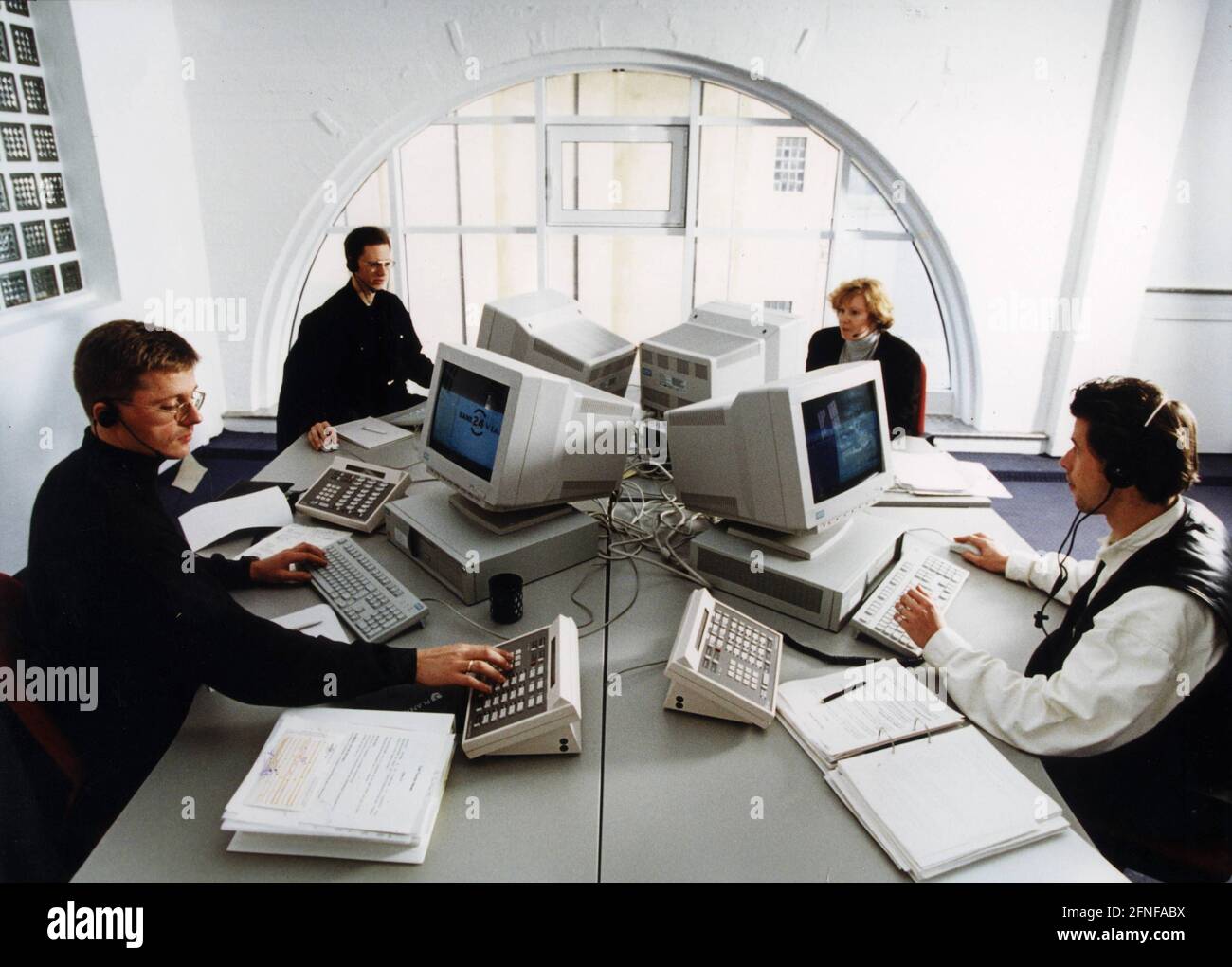Employees process tele-banking orders in the Bank 24 call centre in Bonn. [automated translation] Stock Photo