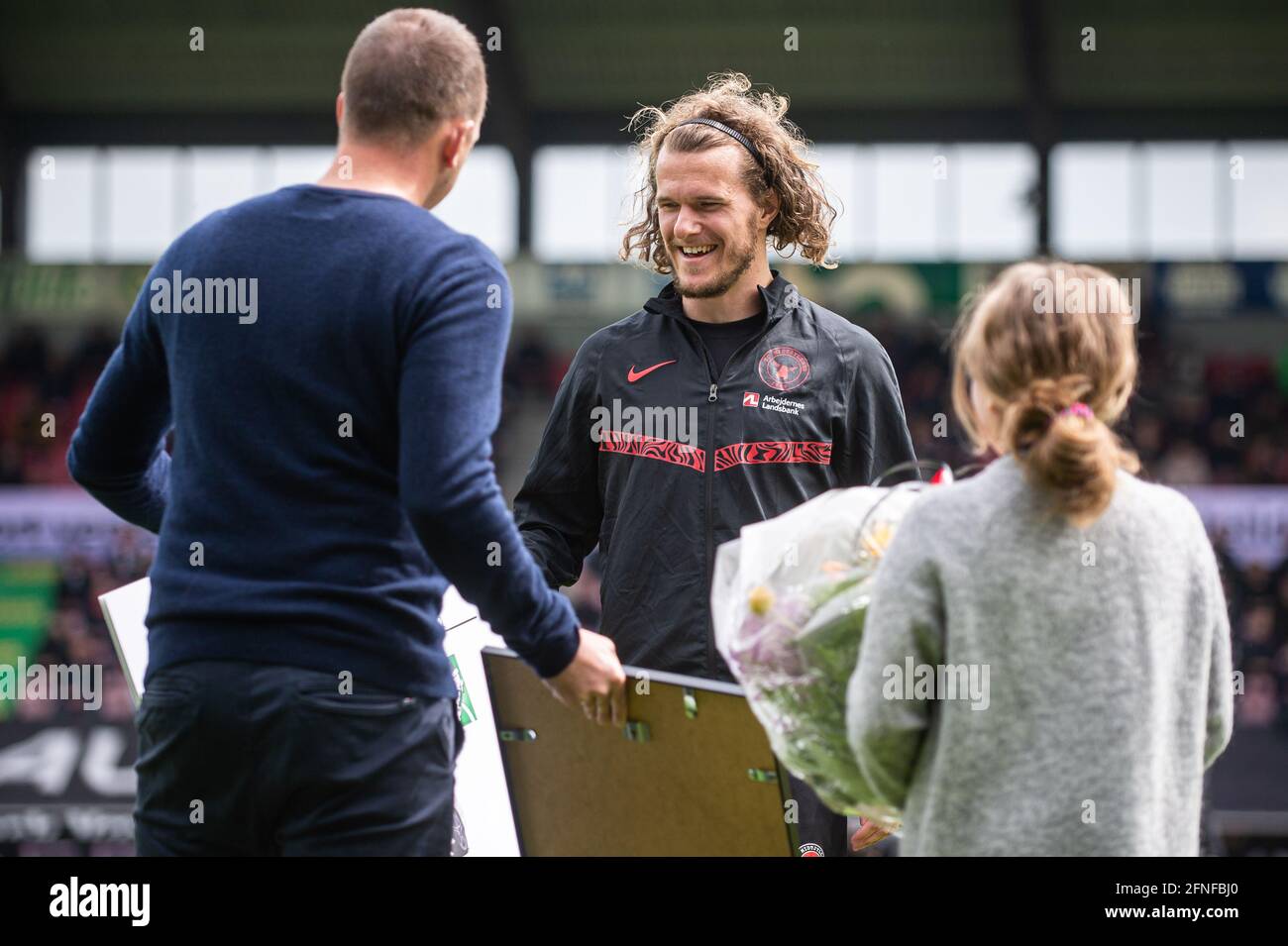 Herning, Denmark. 16th May, 2021. Alexander Scholz (14) of FC Midtjylland is named Player of the Year of the Danish Superliga and receivethe honour before the 3F Superliga match between FC Midtjylland and Randers FC at MCH Arena in Herning. (Photo Credit: Gonzales Photo/Alamy Live News Stock Photo