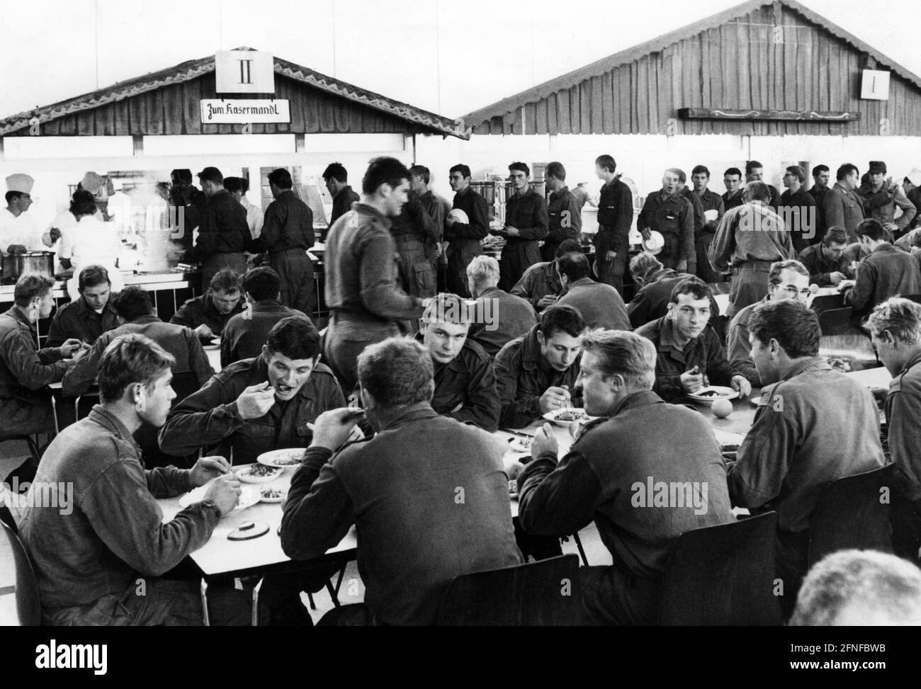 Recruits of the Mountain Tank Battalion 234 have lunch in the troop kitchen. [automated translation] Stock Photo