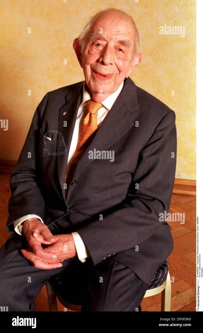 Prof. Dr. Alphons Silbermann color negative 08/99 pp man sociology science journalism grey-haired short-haired glasses half bald serious jacket tie shirt sitting supporting hands smiling half high [automated translation] Stock Photo