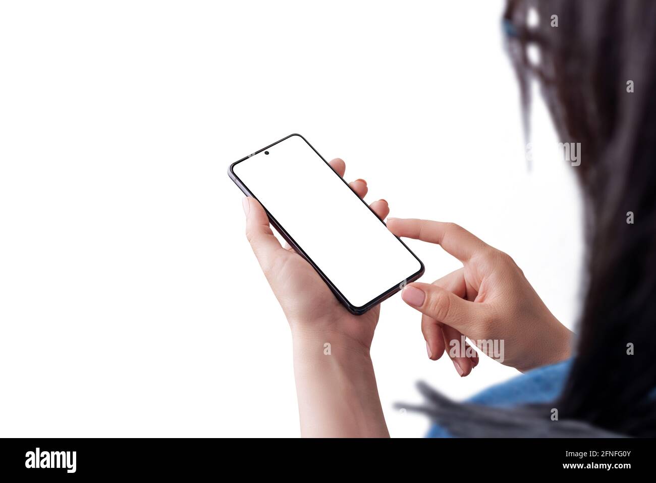 Woman holding smart phone and touch display with right hand concept. View over the shoulder. Isolated screen and background for mockup Stock Photo