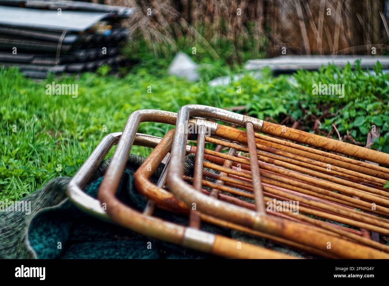 old things thrown out of the house, piled up in a pile of Stock Photo