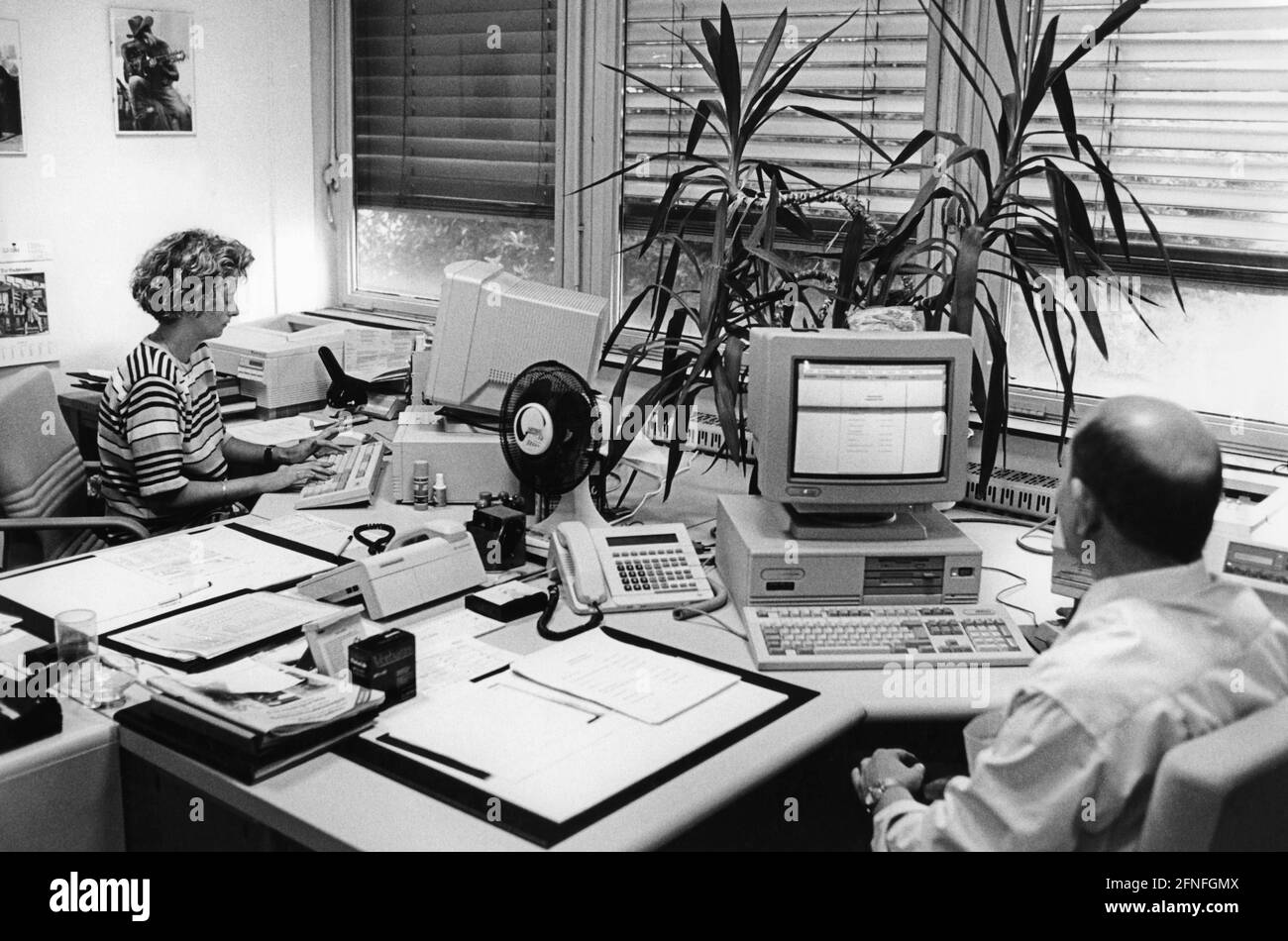 Office workers in a modern office Black and White Stock Photos & Images ...