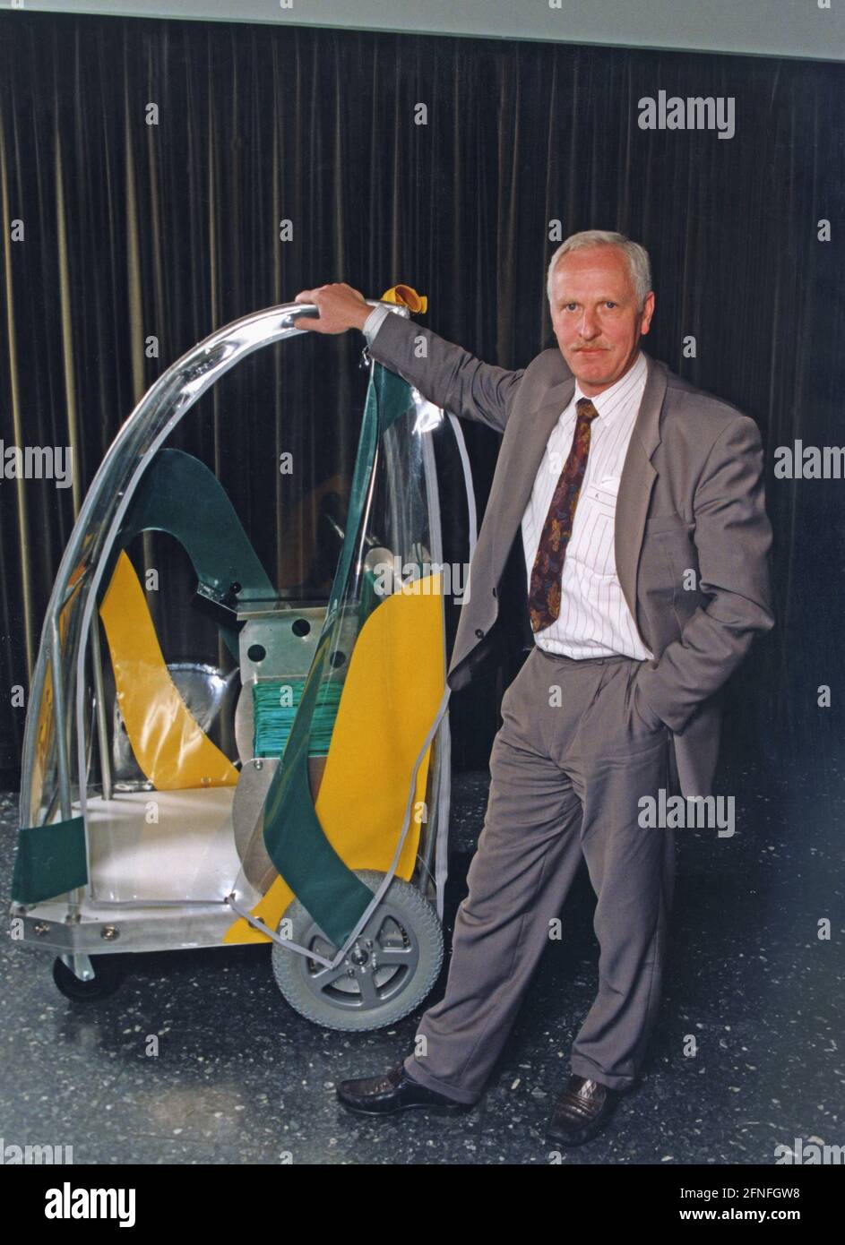 Prof. Dr. Klaus Hofer, Professor of Power Electronics and Drives at Bielefeld UAS, with a vehicle he developed with a linear motor. The two-seater consumes only three KWh of energy per 100km and reaches a top speed of 20 km/h with a range of 20 km. [automated translation] Stock Photo