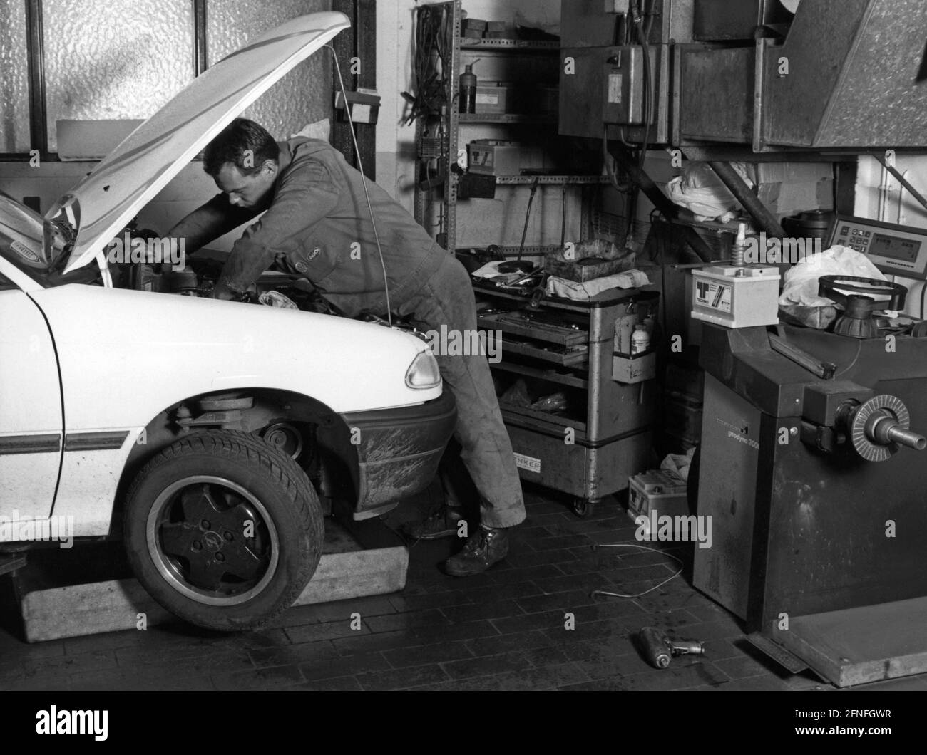 An Opel F the bonnet open in garage. translation] Stock Photo - Alamy
