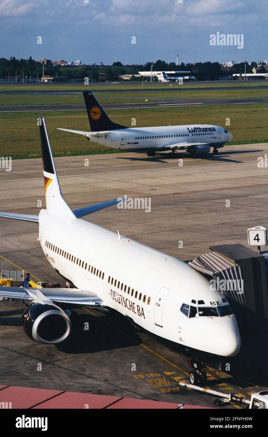 'Two Boeing 737 at Berlin-Tegel Airport. In the foreground the D-ADBX of Deutsche BA and the D-ABEB (christened ''Xanten'') of Lufthansa in the background. [automated translation]' Stock Photo