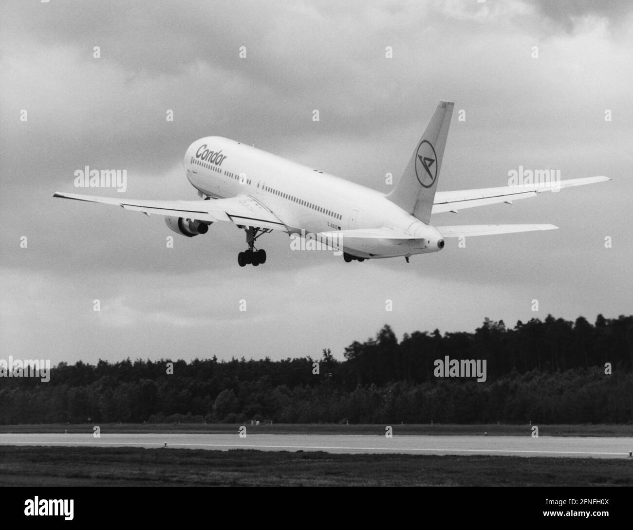A Boeing 767-300 ER (extended range) with the registration D-ABUD of the German airline Condor shortly after take-off. [automated translation] Stock Photo