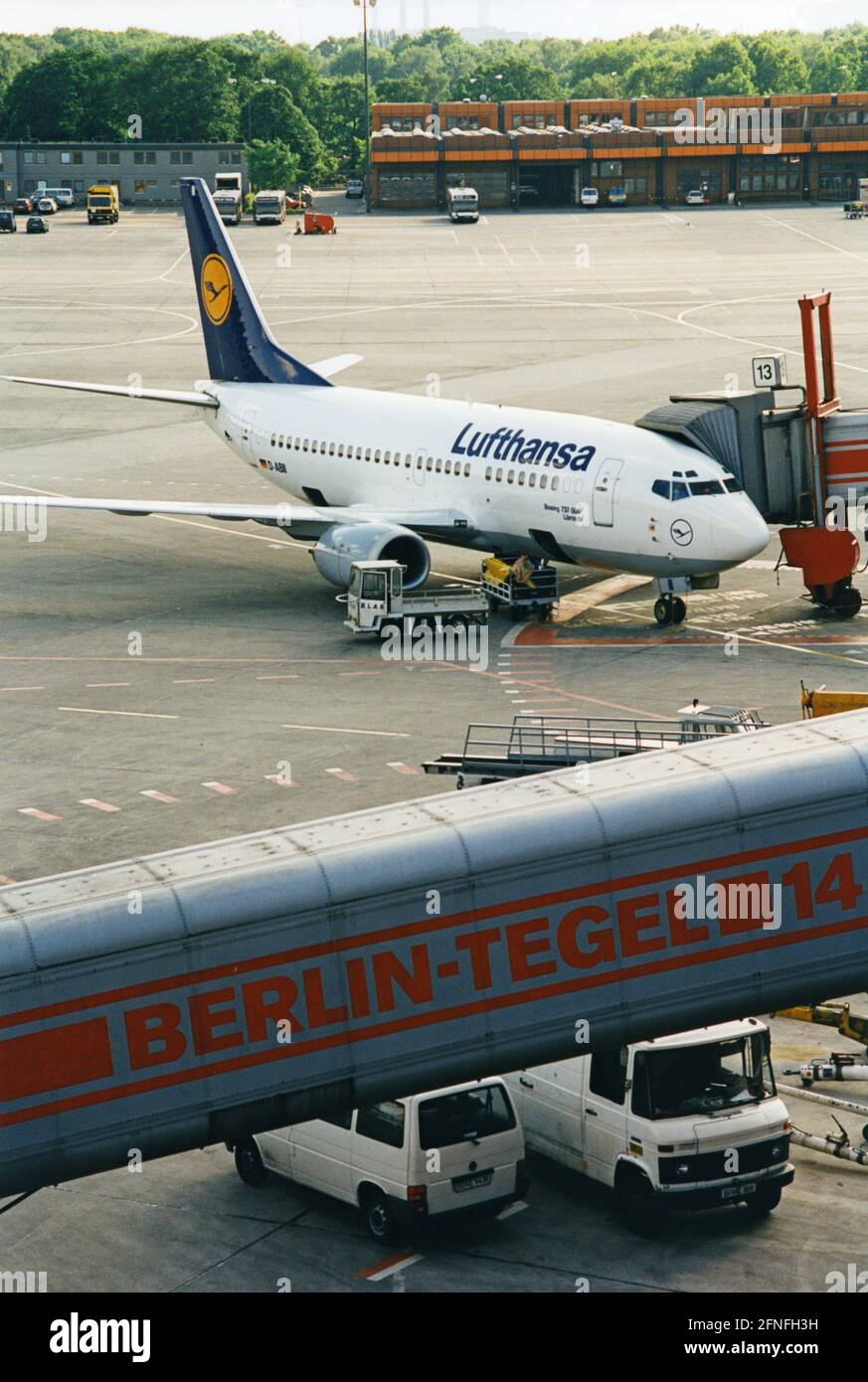 "A Lufthansa Boeing 737-500 (registration D-ABII, baptismal name ""Lörrach"") at the gate at Berlin-Tegel Airport. [automated translation]" Stock Photo