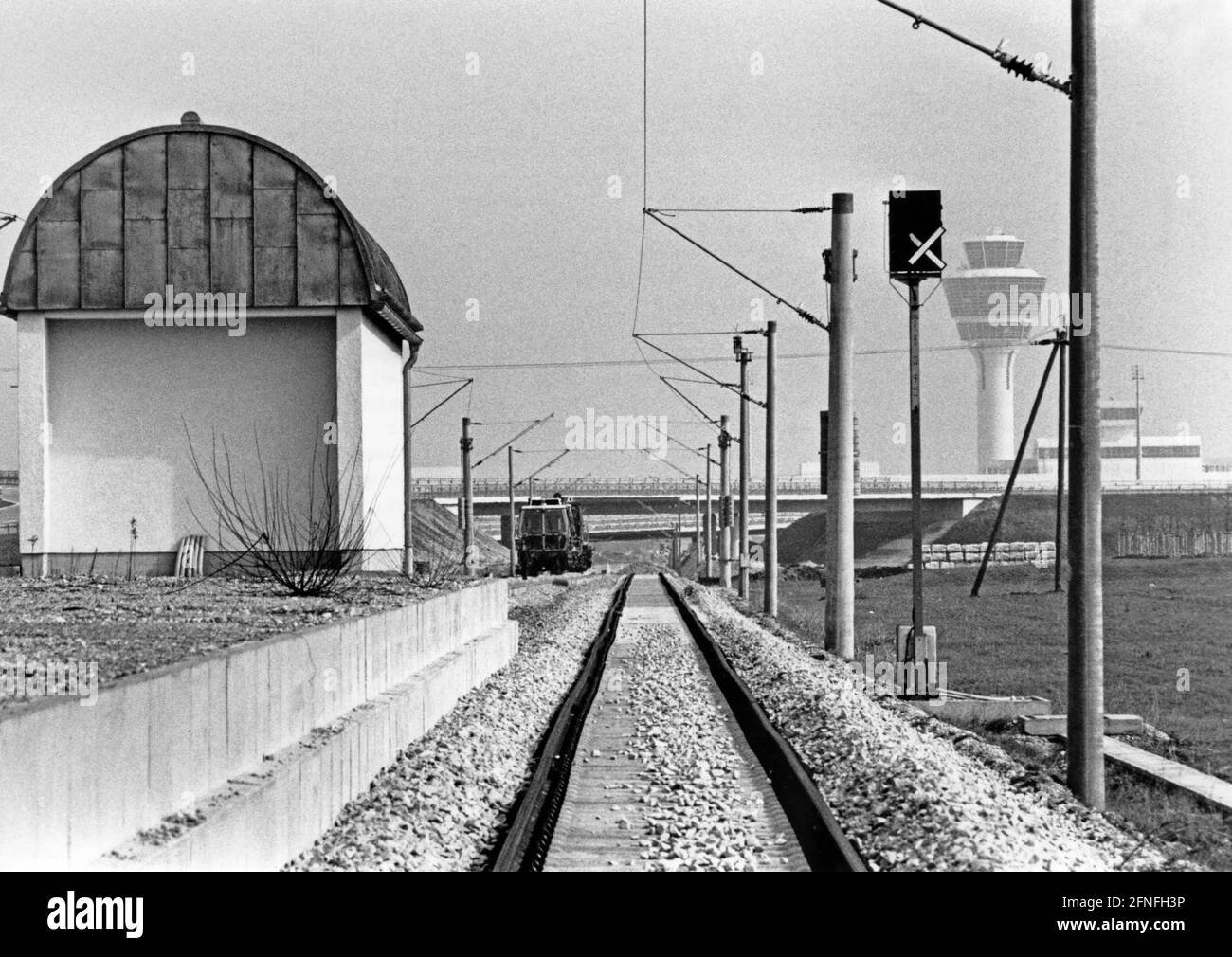 'View of the almost completed S-Bahn station ''Besucherpark'' at the not yet opened major airport Munich II in the Erdinger Moos. The airport tower can be seen in the background. [automated translation]' Stock Photo