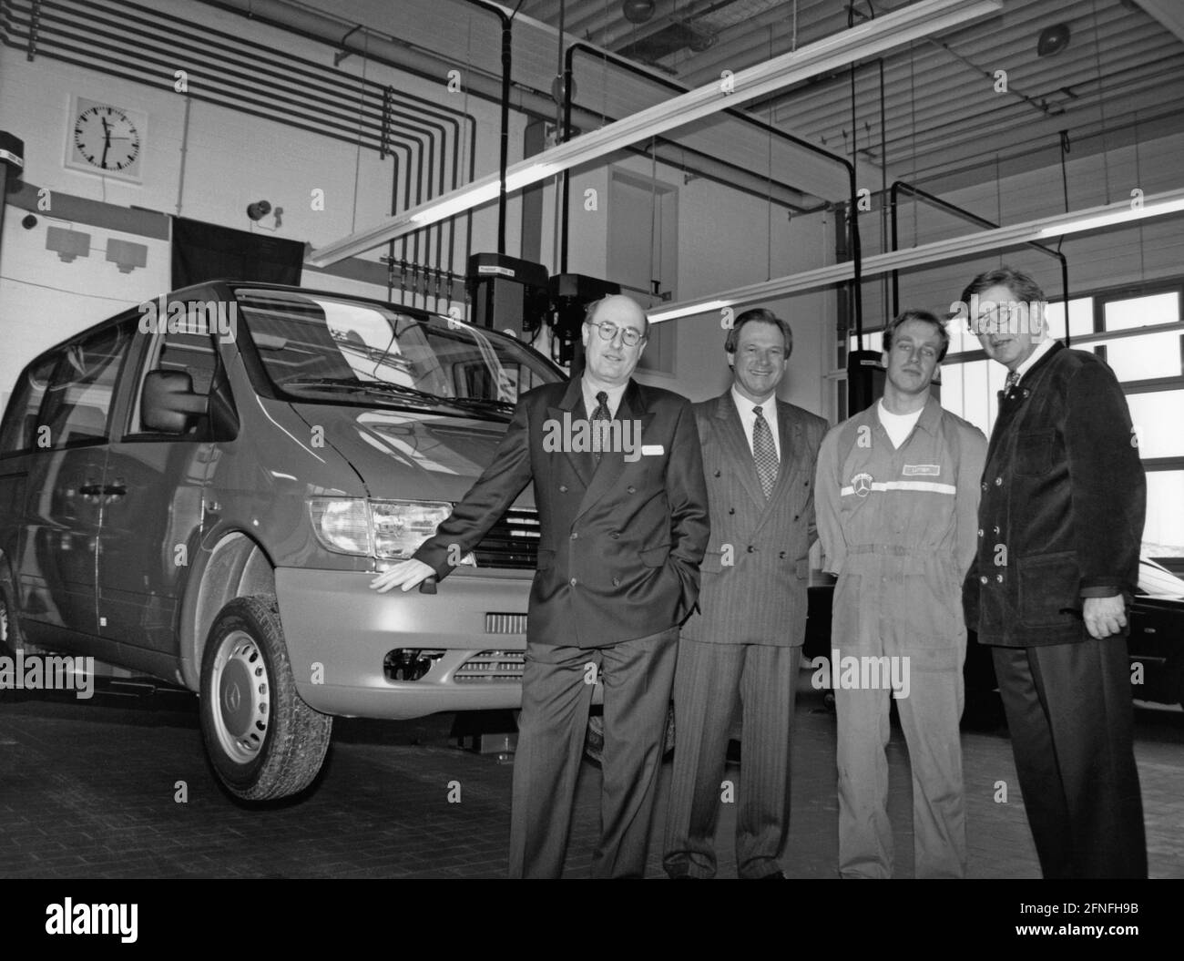 'The ''Vito'' compact van is presented at the Mercedes- Benz Service Centre in Neuperlach. From left to right: Branch Manager Wolfgang Schrempp, City Councillor Hermann Memmel, fitter Max Leitner and Environment Minister Thomas Goppel. [automated translation]' Stock Photo