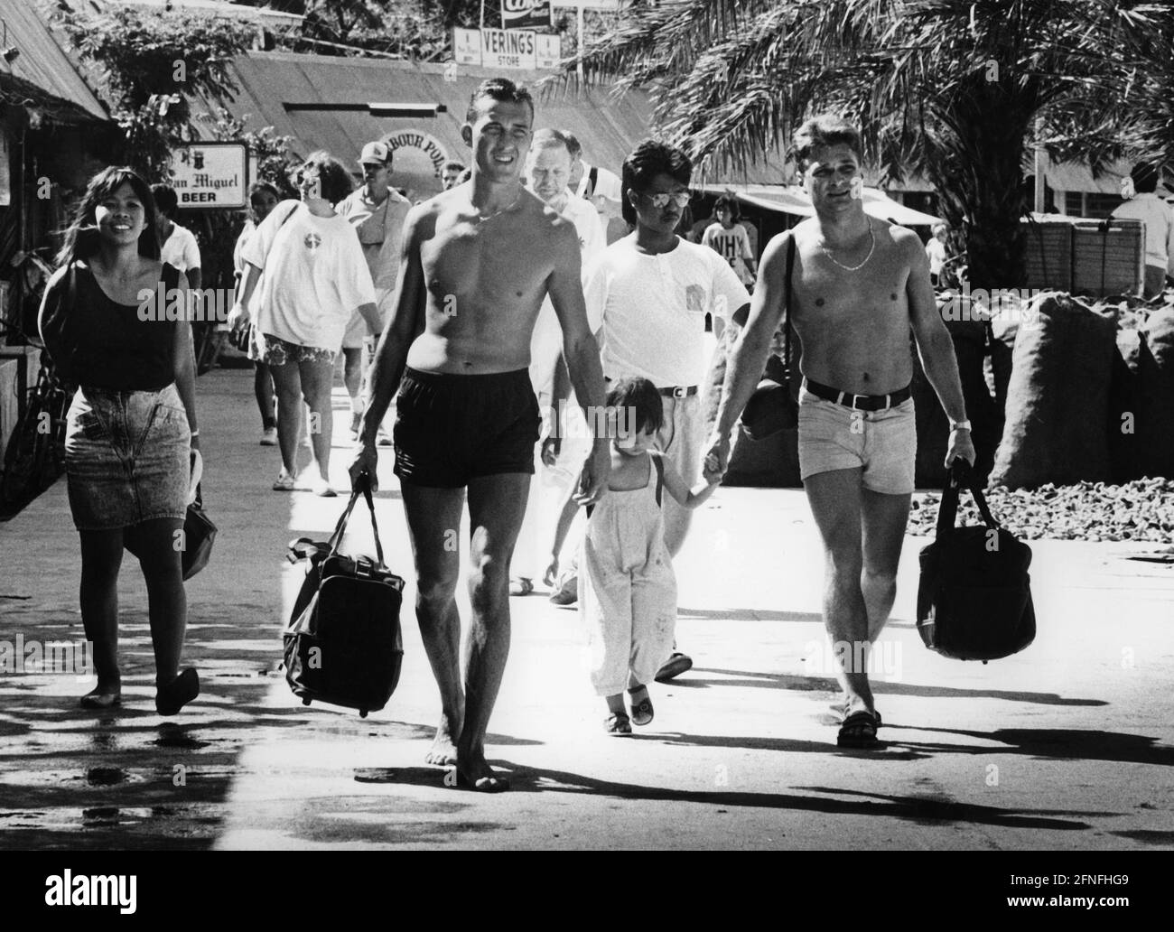 Tourists vacation in Puerto Galera in the Philippines. [automated translation] Stock Photo