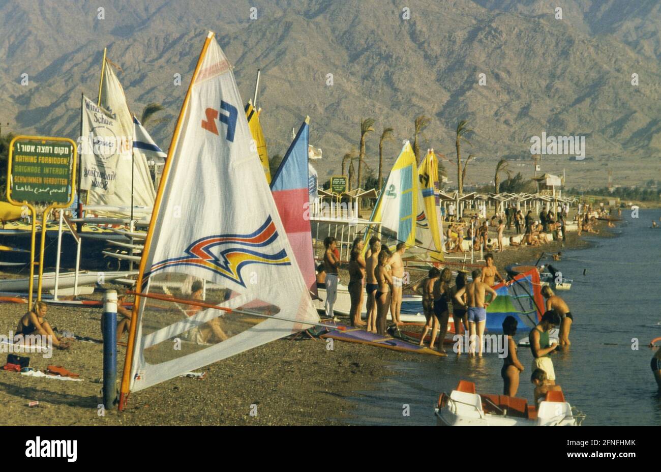 Windsurfers on the beach of Eilat on the Red Sea. [automated translation] Stock Photo