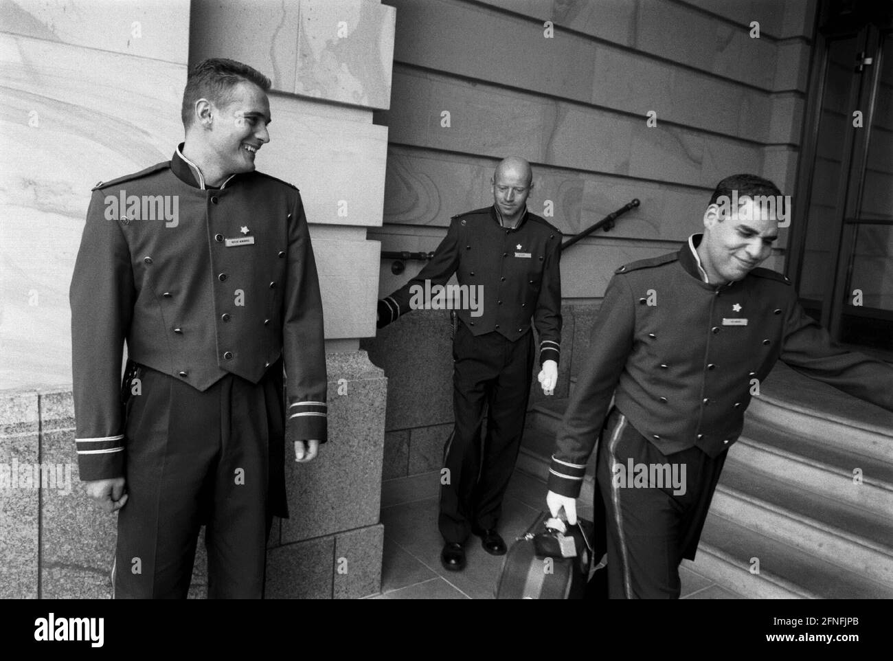 Waiting staff of the Hotel Adlon in front of the hotel entrance, receiving guests, DEU, Berlin-Mitte, 31.08.1999, [automated translation] Stock Photo