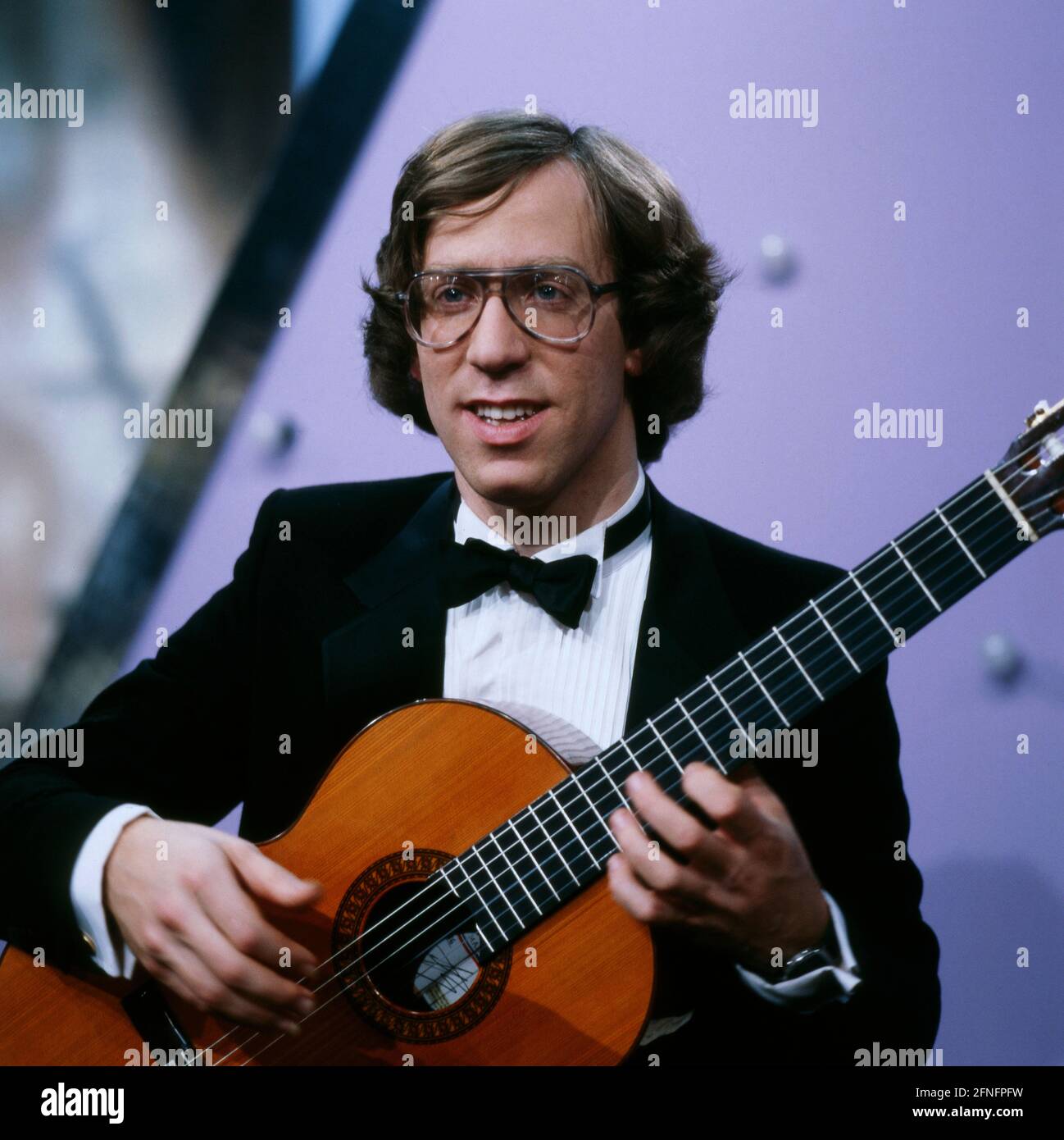 Eliot Fisk, Amerikaner, Klassische Musik Gitarrist, an der Gitarre, 1983. Eliot Fisk, American classical music guitarist, on the guitar 1983. Stock Photo