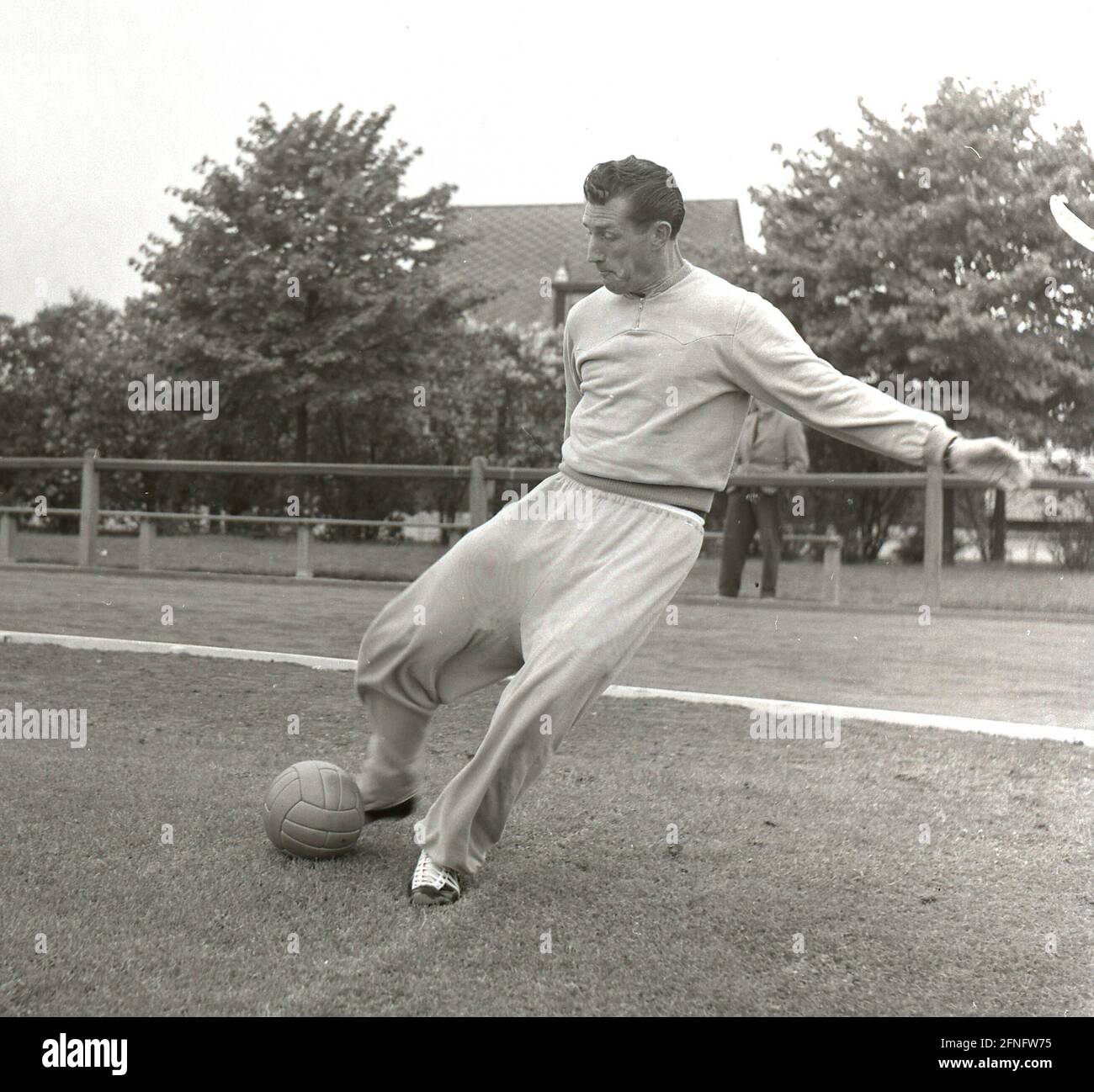 Football World Cup 1958 in Sweden : Fritz Walter (Germany) in action during training , shoots . In the German quarters in Bjärred 17.06.1958 [automated translation] Stock Photo