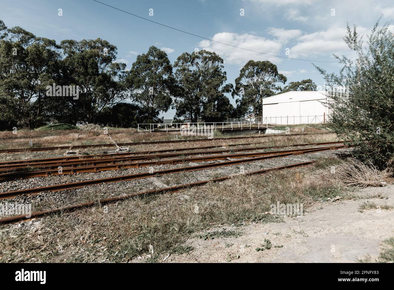 A lever used on Train tracks to switch tracks on an abandoned railroad Stock Photo