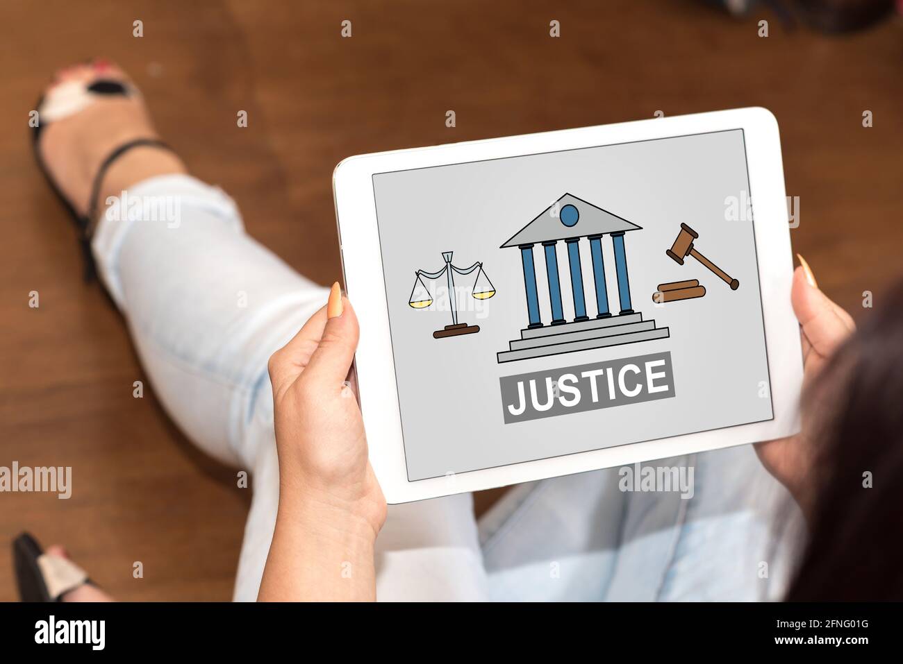 Justice Tablet Tablet screen displaying a justice concept Stock Photo - Alamy