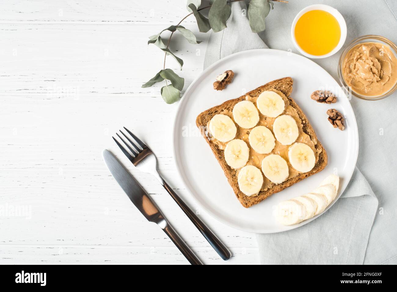 Homemade peanut butter sandwich with bananas and honey Stock Photo Alamy