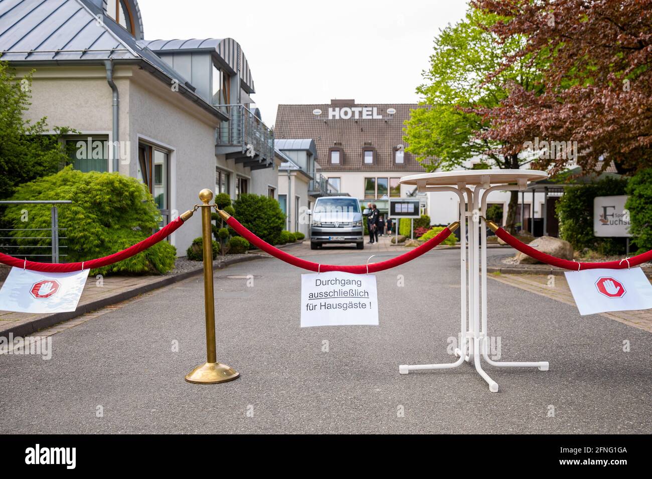 Barsinghausen, Germany. 17th May, 2021. Football: Bundesliga. The words 'Passage for house guests only!' can be read on a barrier outside the Sporthotel Fuchsbachtal in the Hanover region, where the team of Bundesliga football club Werder Bremen is in quarantine training camp. Credit: Moritz Frankenberg/dpa/Alamy Live News Stock Photo