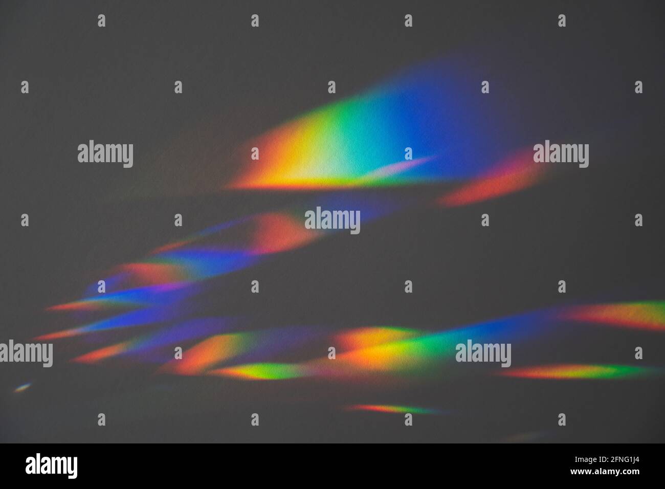 Prism Rainbow Specs on Grey paper Background Overlay Stock Photo Alamy