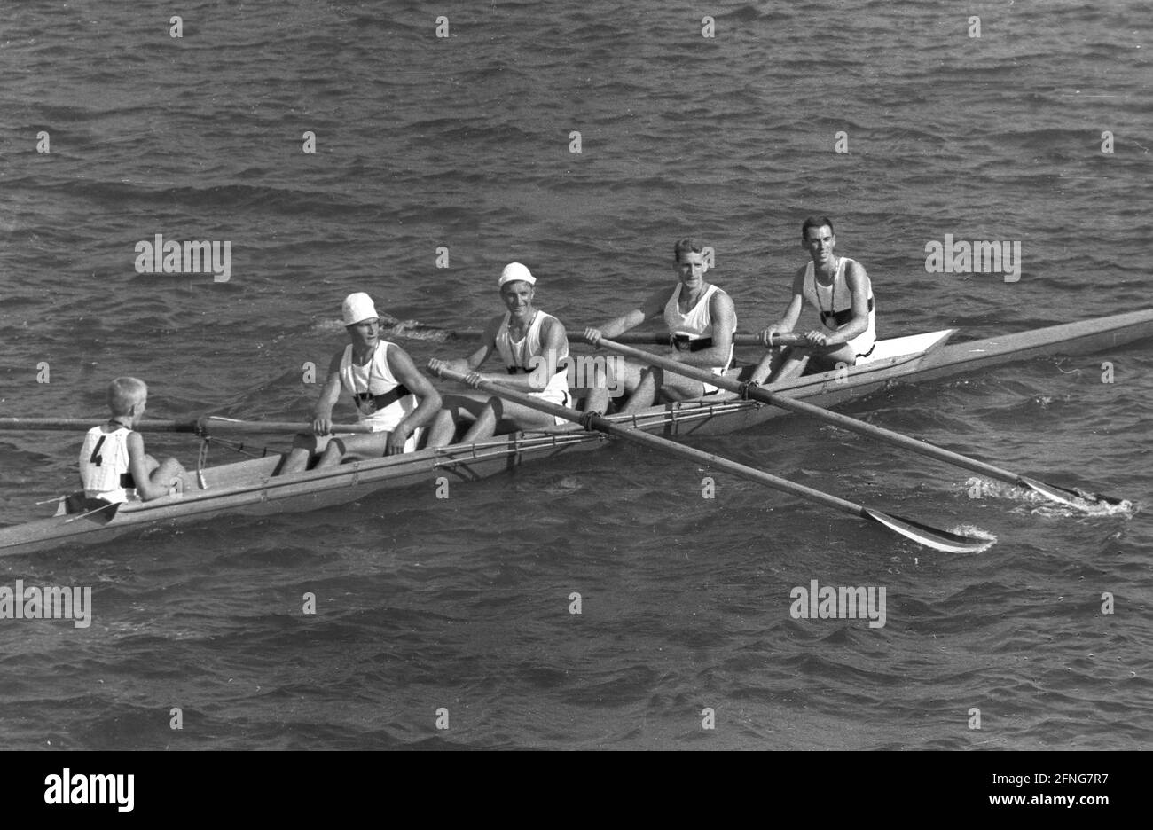 1960 Summer Olympics in Rome. Rowing: The coxed four of the rowing club Germania Düsseldorf won the gold medal. From left: cox Michael Obst, stroke Jürgen Litz, Klaus Riekmann, Horst Effertz and Gerd Cintl. [automated translation] Stock Photo