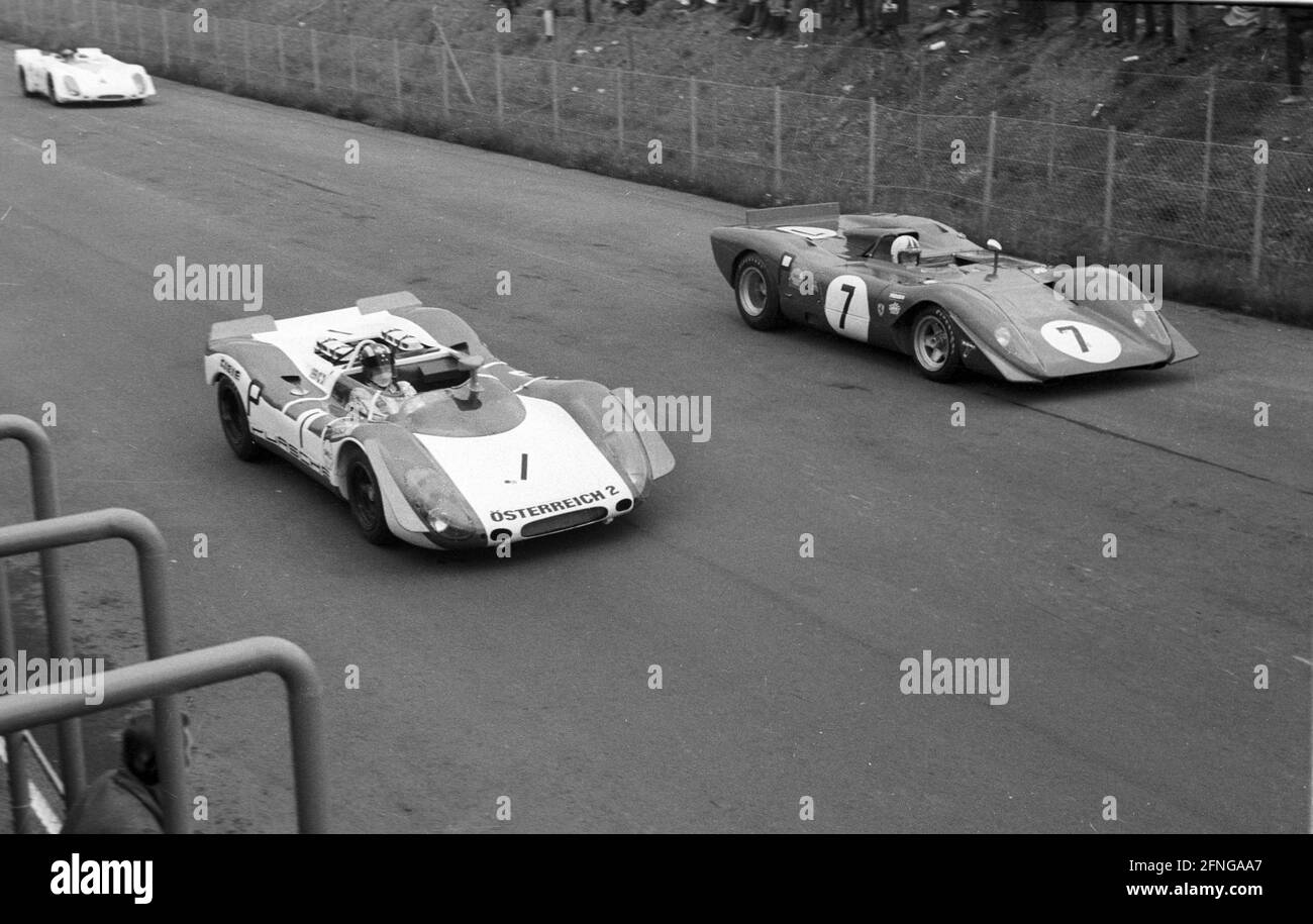 1000 km race at the Nürburgring 01.06.1969. Starting grid. In front: Porsche 908/02 Flunder of Jo Siffert and Brian Redmann . Above: Ferrari 312P of Pedro Rodriguez and Chris Amon. [automated translation] Stock Photo
