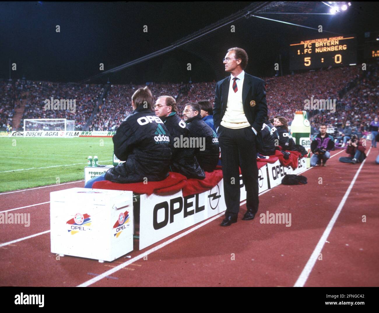 Bayern Munich - 1. FC Nuremberg 5:0 /03.05.1994/ Repeat match Coach Franz Beckenbauer (FC Bayern Munich) stands next to the bench , behind the scoreboard with the final result. [automated translation] Stock Photo