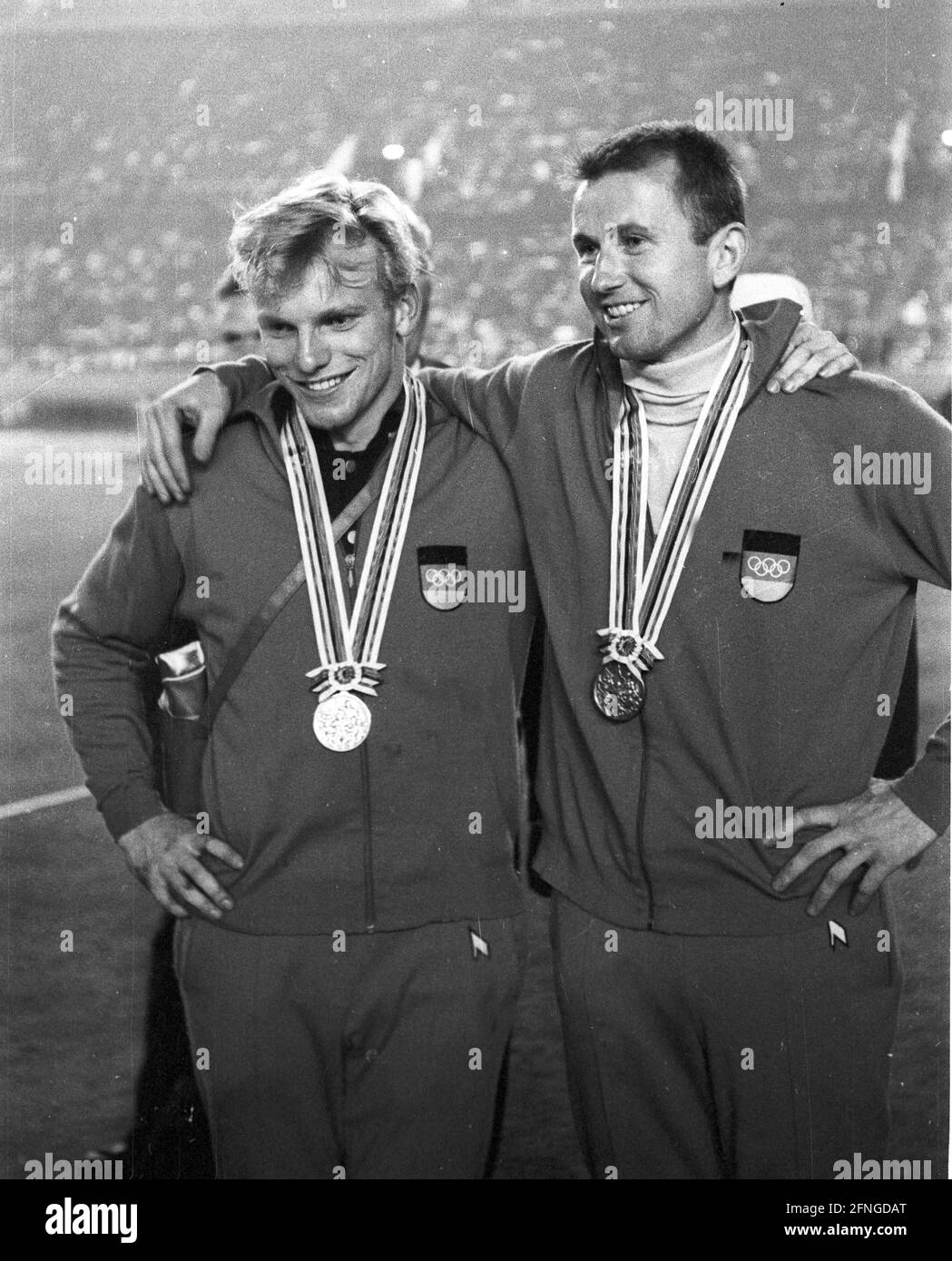 Summer Olympics in Tokyo 1964: Athletics: Pole vault: Wolfgang Reinhardt (left) with silver medal and Klaus Lehnertz (both FRG/German team) with bronze medal. Photo 21.10.1964. [automated translation] Stock Photo