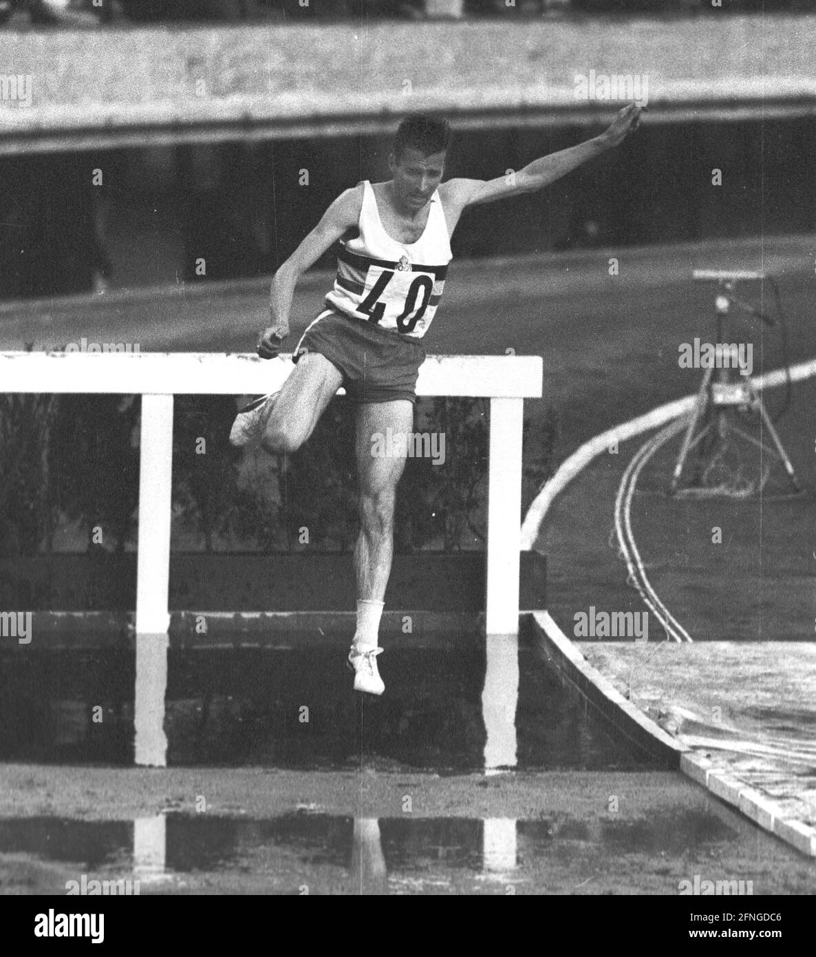 Summer Olympics in Tokyo 1964. athletics: 3000m steeplechase: Gaston Roelants (BEL) action at the water ditch. Rec. 17.10.1964. [automated translation] Stock Photo