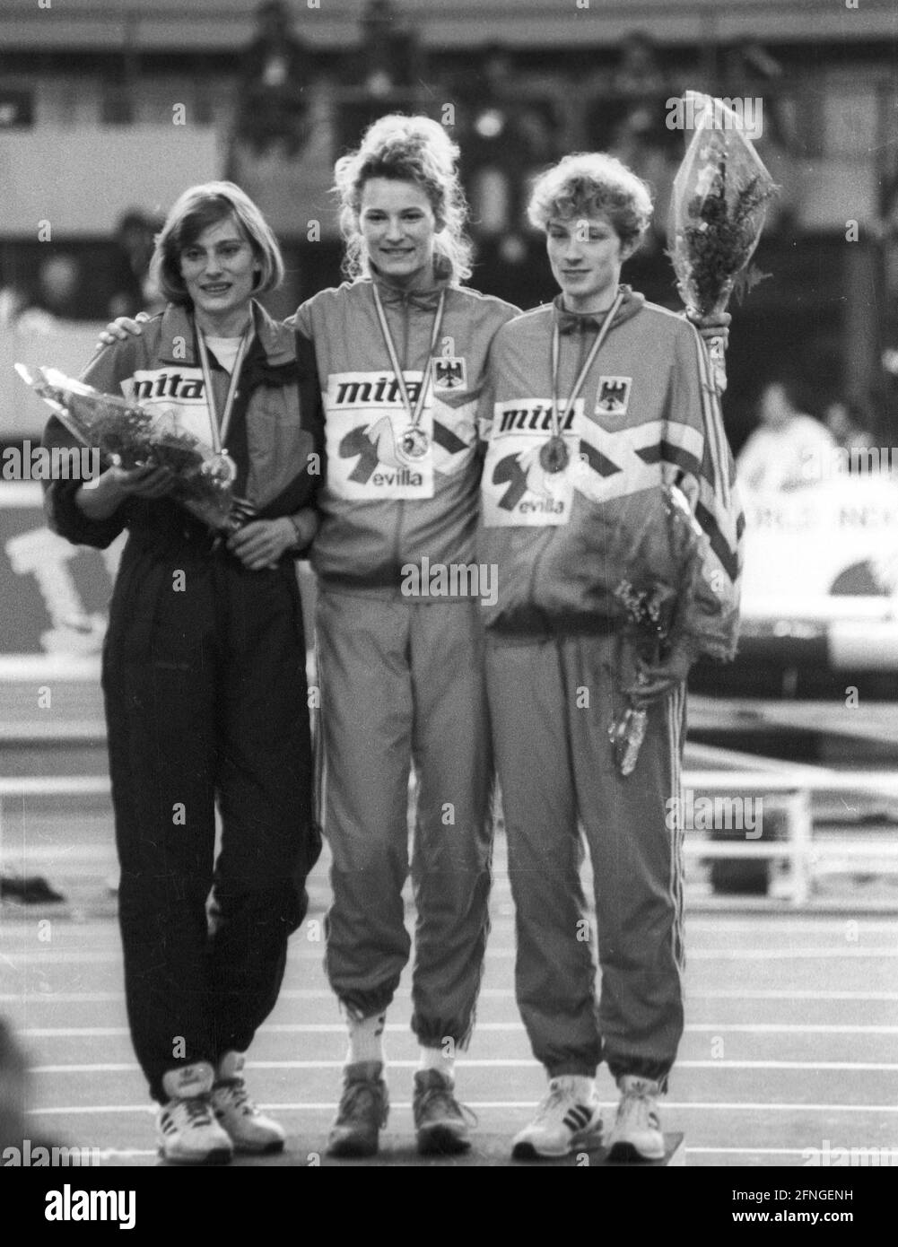 World Championships in Indoor Athletics 1991 in Seville. Award ceremony women's high jump. 09.03.1991. From left: Tamara Bykova (URS/Silver), Heike Henkel (Deut./Gold) and Heike Balck (Deut./Bronze). [automated translation] Stock Photo