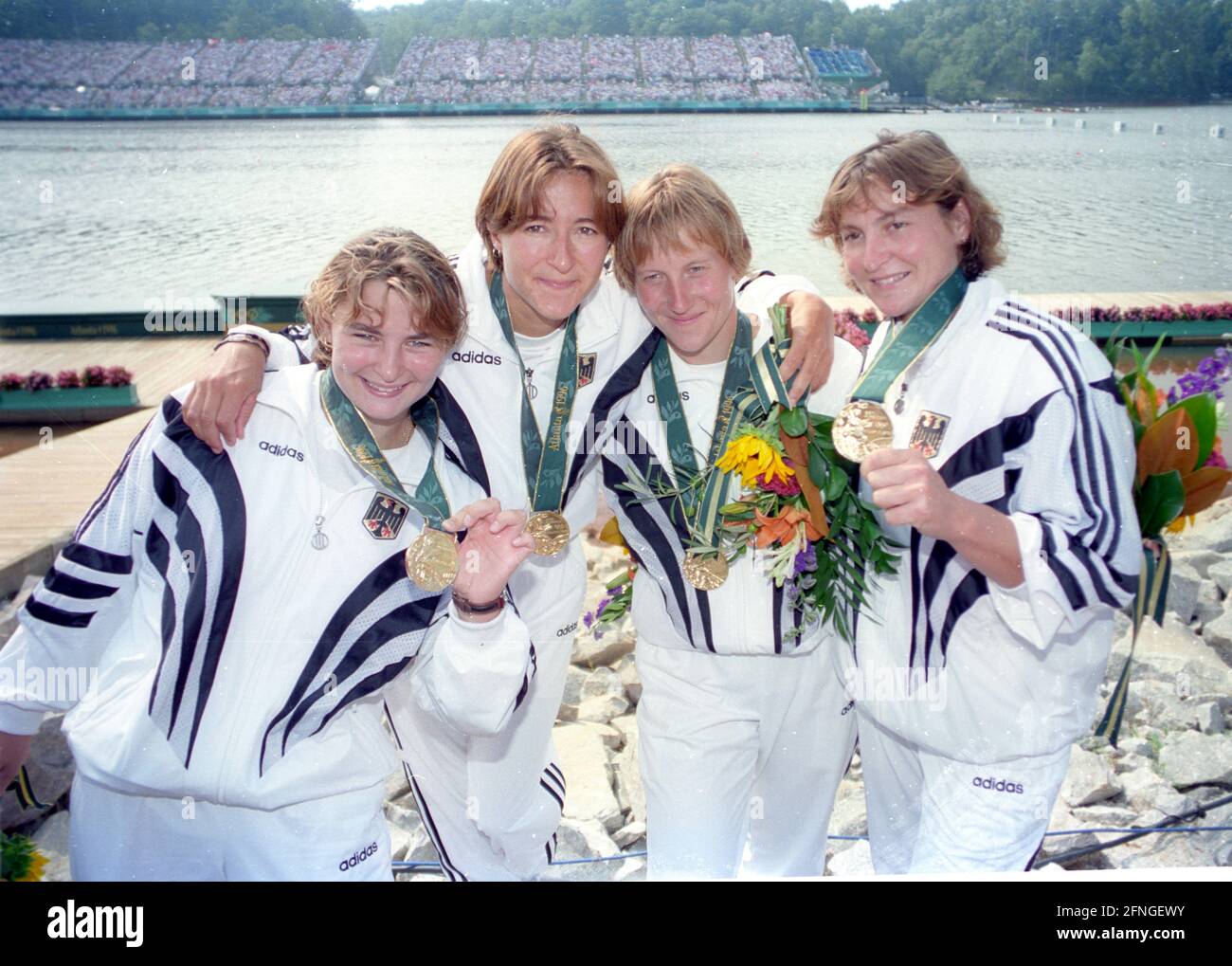 Olympic Games 1996 in Atlanta. Canoe racing, award ceremony women's four-man kayak: Winner Germany with (from left) Manuela Mucke, Ramona Portwich, Anett Schuck and Birgit Fischer 03.08.1996 [automated translation] Stock Photo