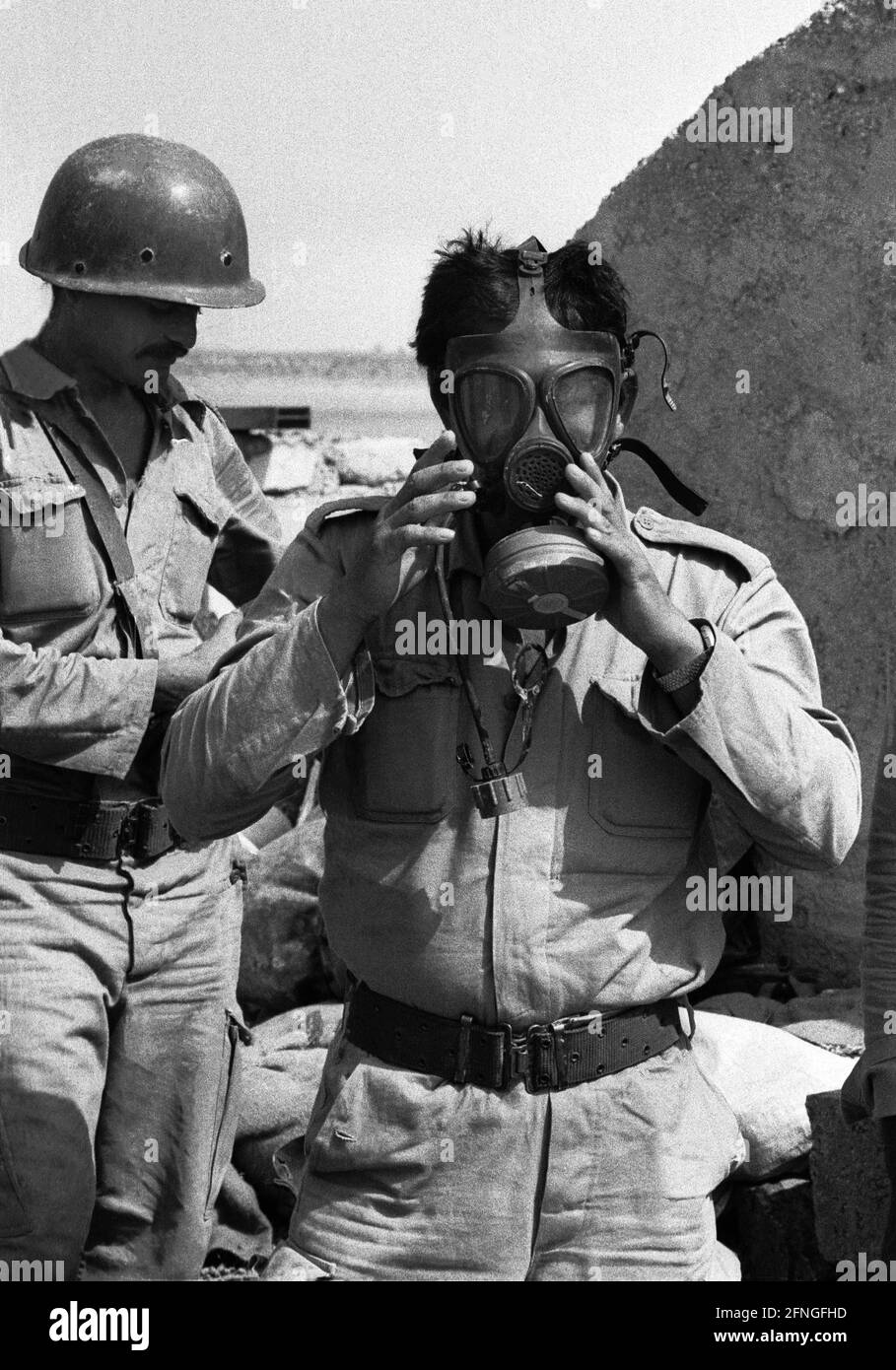 Kuwait, 8/28/1990 Archive #: 20-66 On August 2, 1990, Iraq invaded the neighboring emirate of Kuwait. Five months later, an international coalition led by the United States intervened in the conflict and pushed Iraqi forces back across the border.  Photo: Iraqi soldiers with gas masks [automated translation] Stock Photo