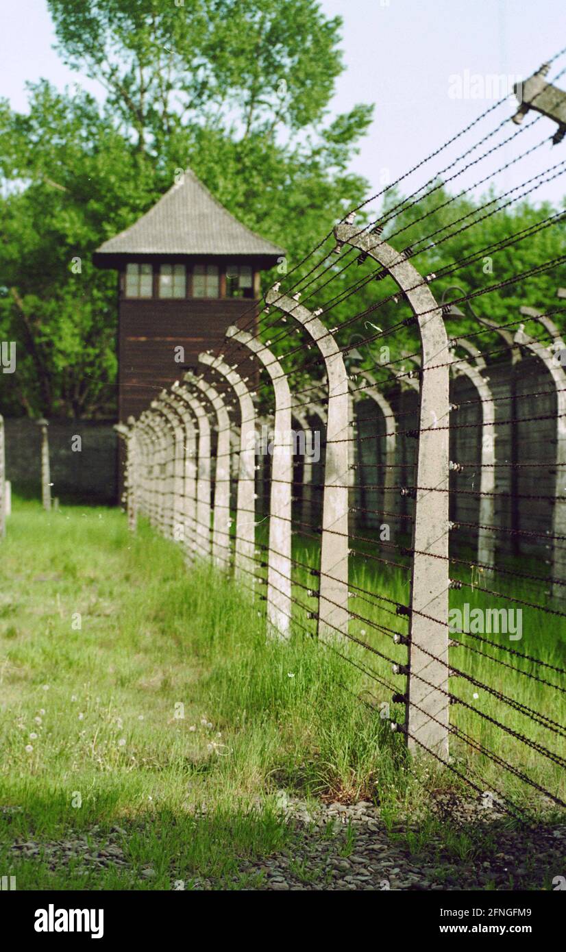 Poland / History / Concentration camp / 5 / 1993 Concentration camp Auschwitz (old part), camp fence and watchtower // Jews / Nazi / Fascism // World Heritage UNESCO *** Local Caption *** History / Fascism / Poland / Nazism / Jews / Concentration camp Auschwitz (old part). Fences and barbed wire. // UNESCO World Heritage Site / [automated translation] Stock Photo
