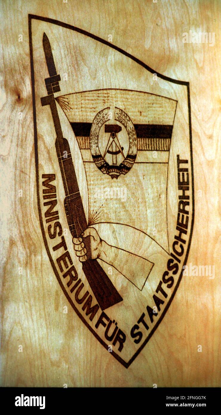 Berlin / GDR / 1990 STASI coat of arms burnt in wood. Hanging in the  Ministry for State Security in Normannenstrasse // Stasi / Coat of arms /  State Security / State [automated translation] Stock Photo - Alamy